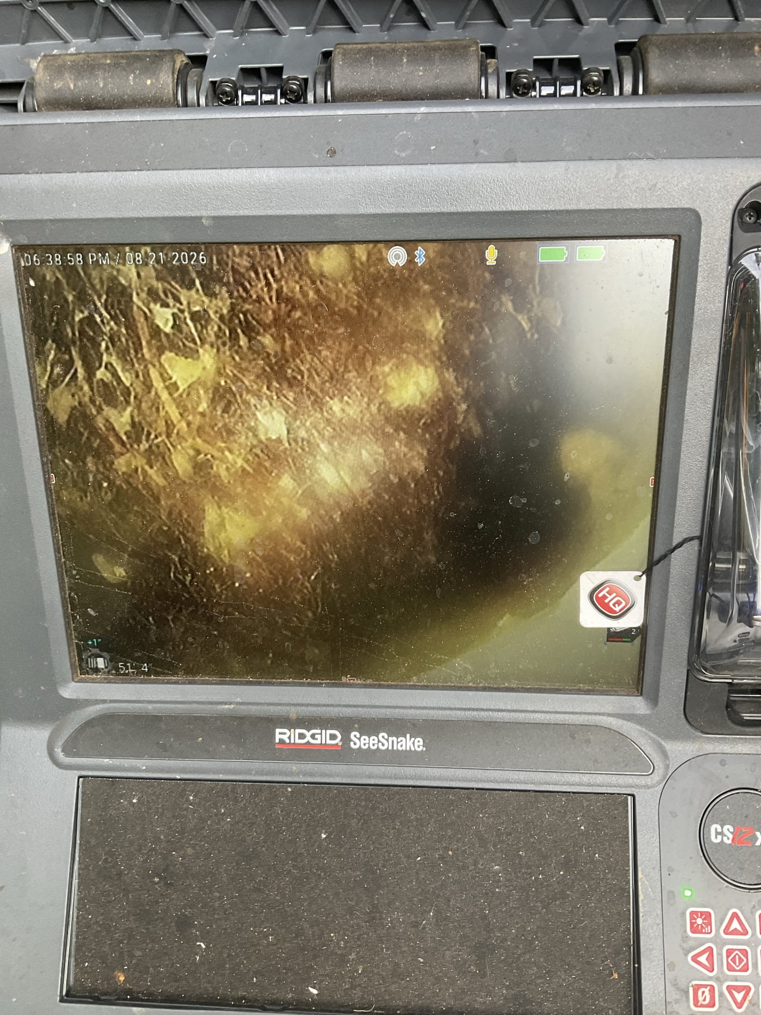 Cleared main line stoppage with chain snake , did camera inspection after line is cleared, found major roots penetration issue about 50 feet from clean out in the back ,showed customer camera image , no warranty 