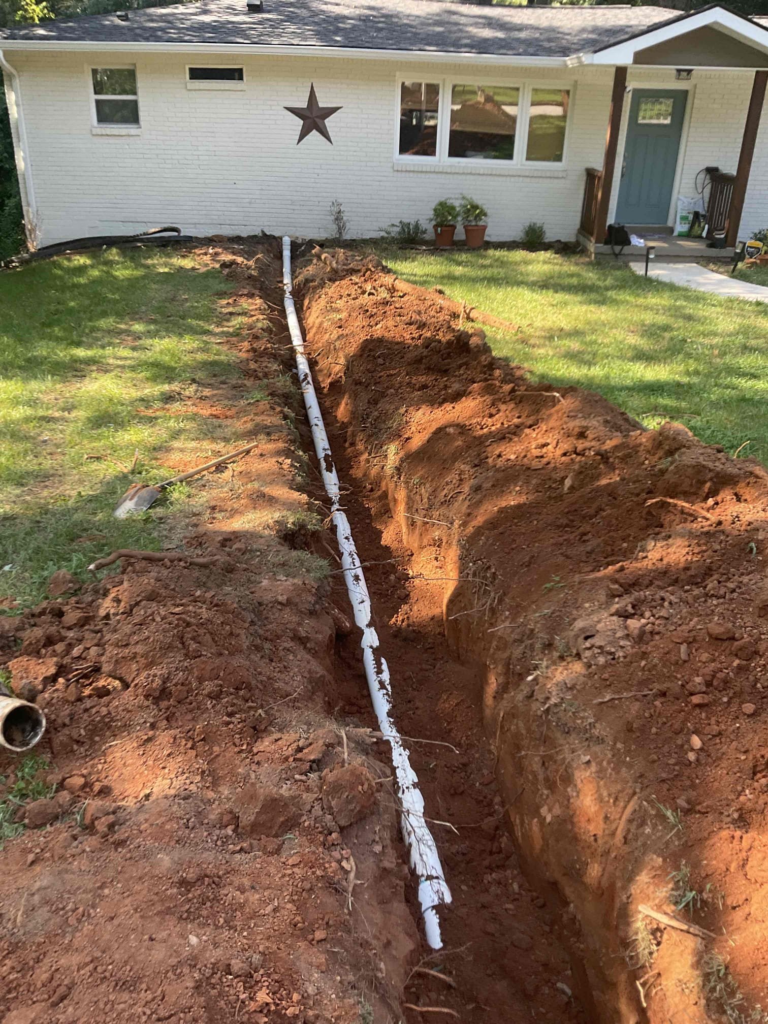 Replaced sewer service line from house to the street, 