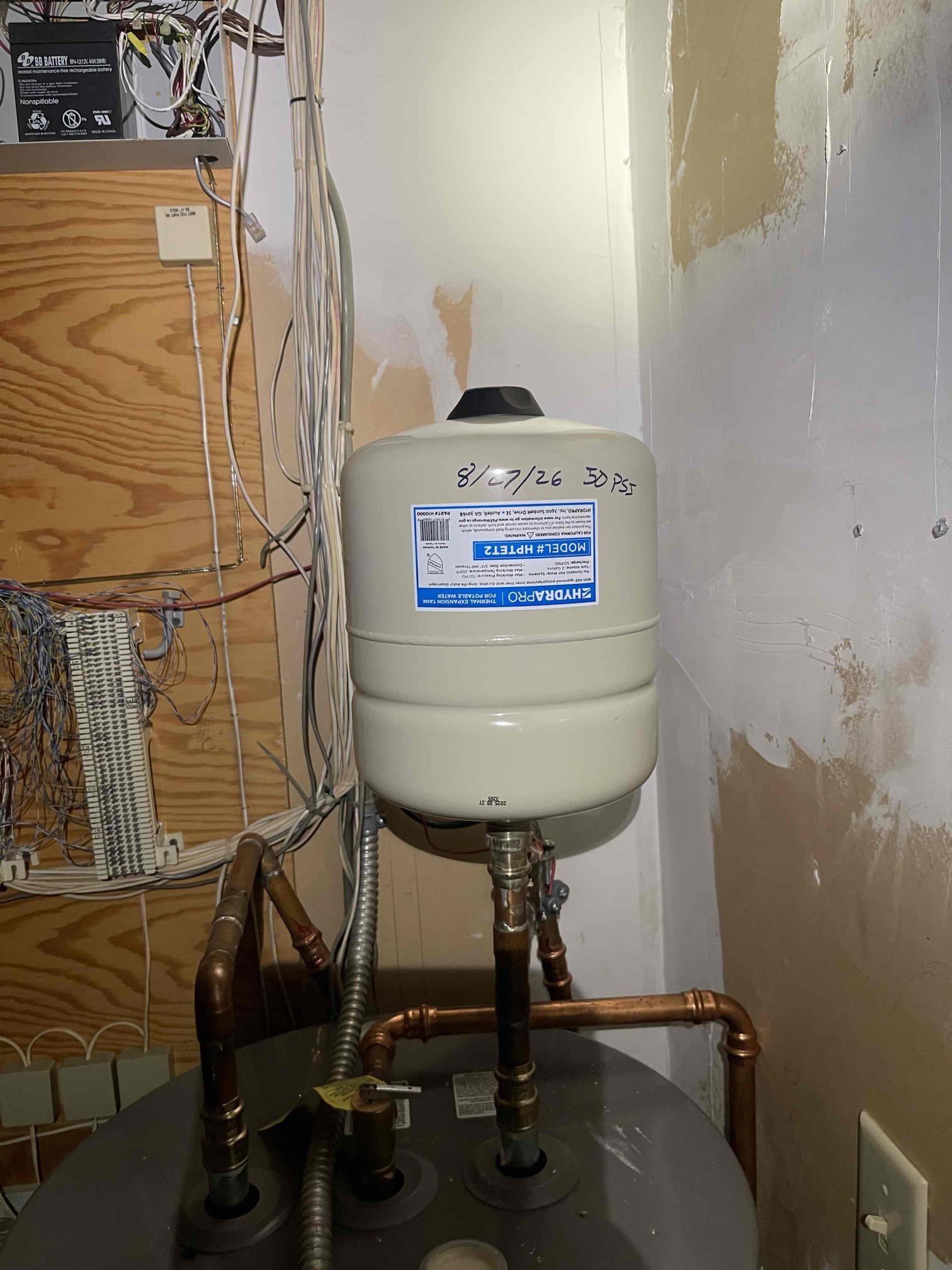 Came out for a high water bill. We dug up the meter and confirmed a leak. Closed the main valve inside the building and the leak stopped, so we concluded issue was inside the building. Found a pressure assist toilet that was shut off but still leaking. The bladder inside the pressure assist mechanism had ruptured, causing toilet to run non stop. Building owner believed they had the water shut off, but the stop valve was not able to close all the way and the toilet was still running. We checked water pressure and found it was at 100 psi, and had also ruptured the bladder on the water heater expansion tank, as both bladders are rated for up to 80 psi. Notified building owner and received approval to replace the PRV, the toilet pressure assist mechanism, and the water heater expansion tank. Attempted to shut off the water at the meter and found the curb stop spins but does not shut off the water. We were able to close the gate valve before the PRV inside the building but had to leave it i