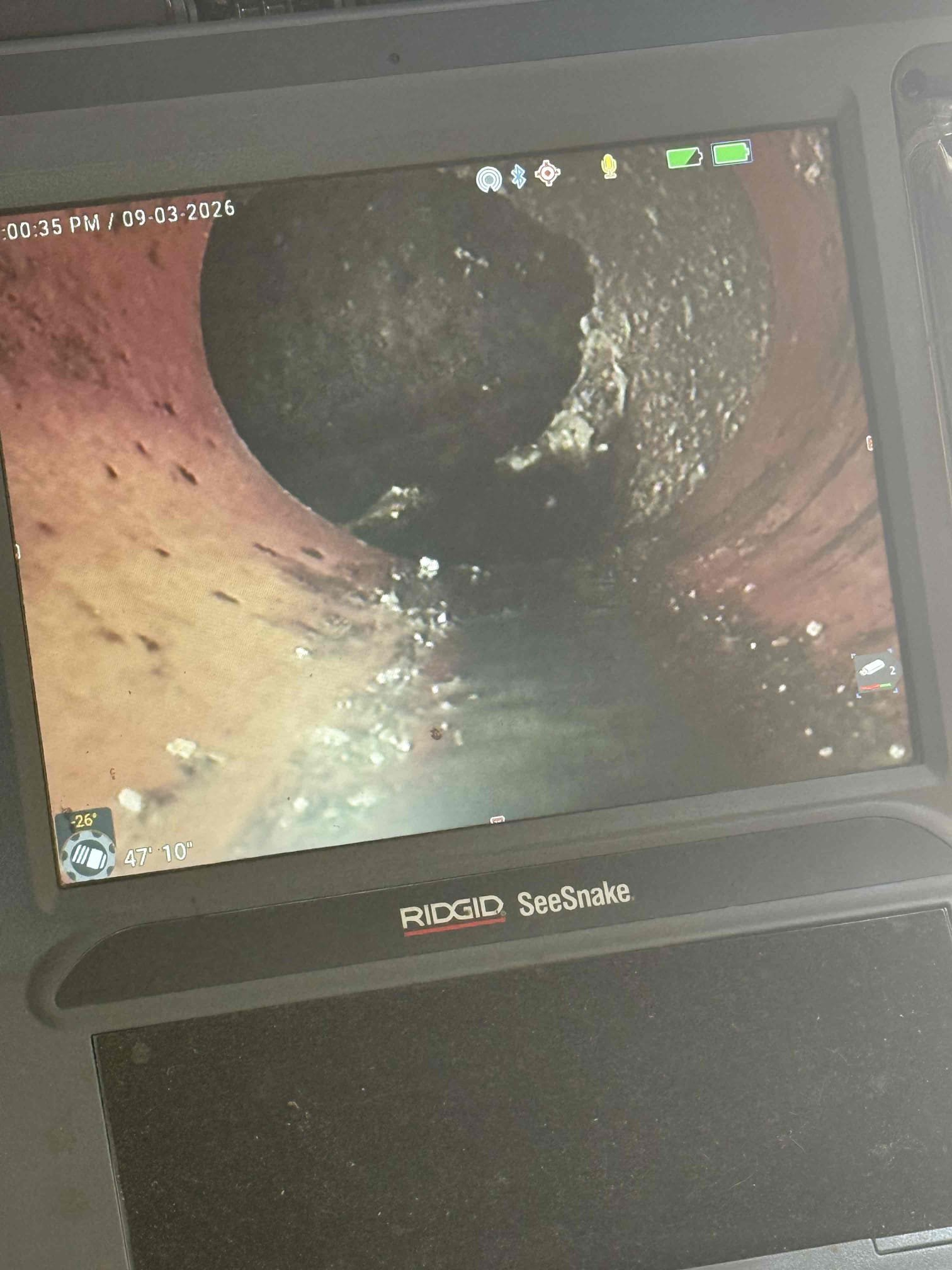 Main line blockage upon arrival. Customer stated his wife put a lot of food scraps down the line and now the toilets and drains are backed up. Informed customer we could run our cable down the line to attempt to clear it. Gave customer estimate, customer approved estimate. Ran cable out 50 ft and cleared blockage. Ran camera behind to ensure the line is clear all the way to the city tap. Allowed water hose to run in line for 5 minutes and the line did not back up. Line is flowing properly and no longer backed up upon departure 