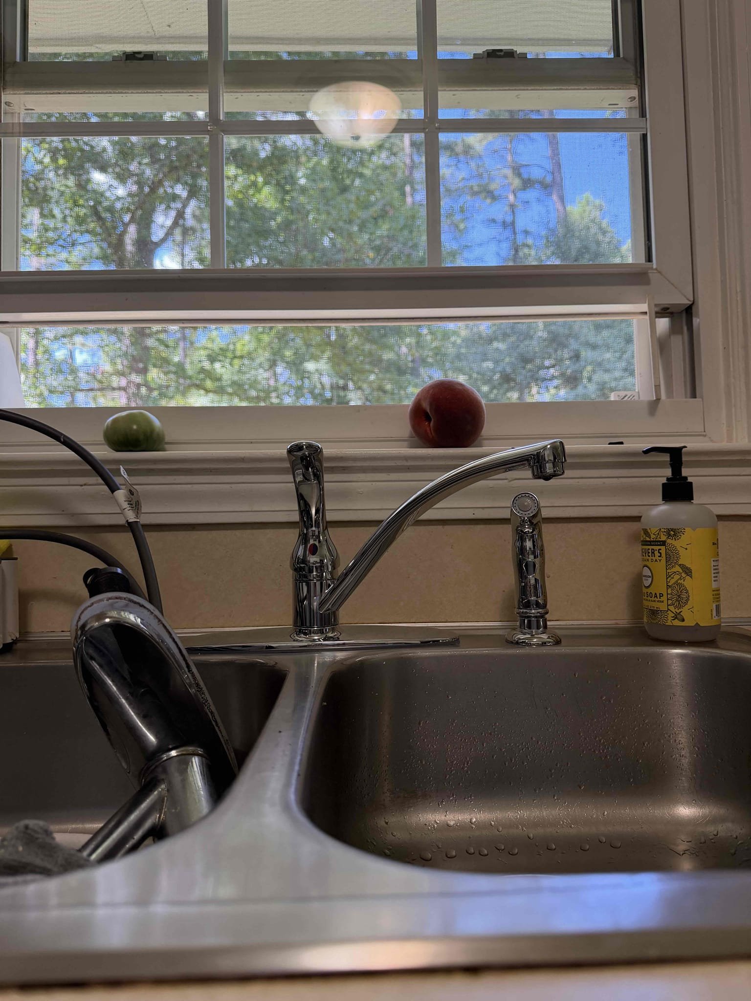 Customer called us out for a leak under kitchen sink. Found water dripping from joint of P-trap. About 11 months ago we replaced a section of drain pipe and reworked piping under kitchen sink so went ahead and fixed leaking under sink under warranty. Also, customer mentioned that kitchen faucet was dripping. Gave customer options as far as repairs and replacements and customer wanted to go ahead and replace faucet. Remove existing faucet. Furnished and installed new faucet and tested. At this time no lease or present at this time in faucet was working as it should. Cleaned up work area.