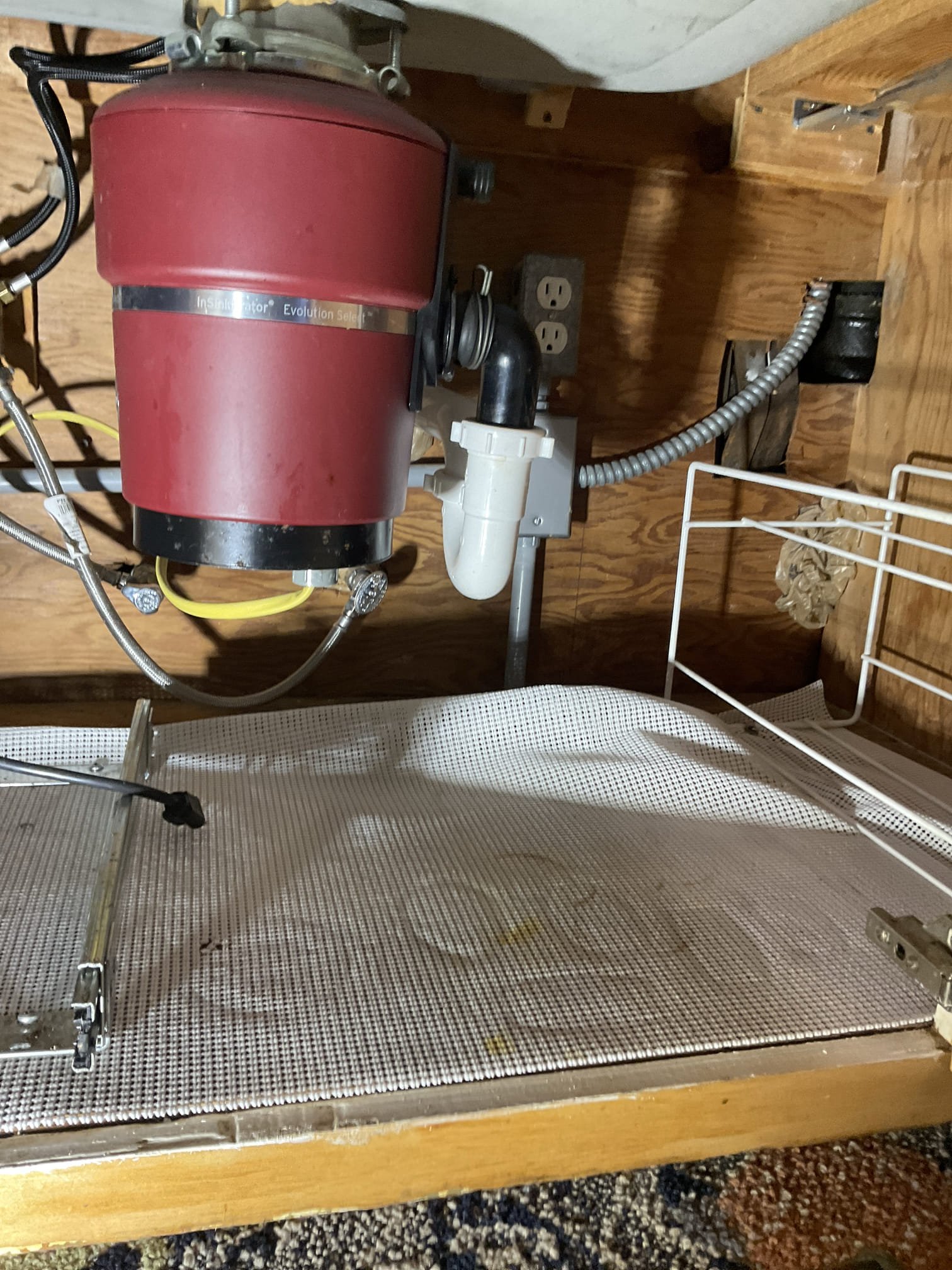 Today we bypassed kitchen sink drain from wall thru floor connect to pvc pipe in crawl space .installed new p trap and AAV under the sink , removed old unused hot water recirculating pump under the kitchen sink , we connected supply line together without pump . 