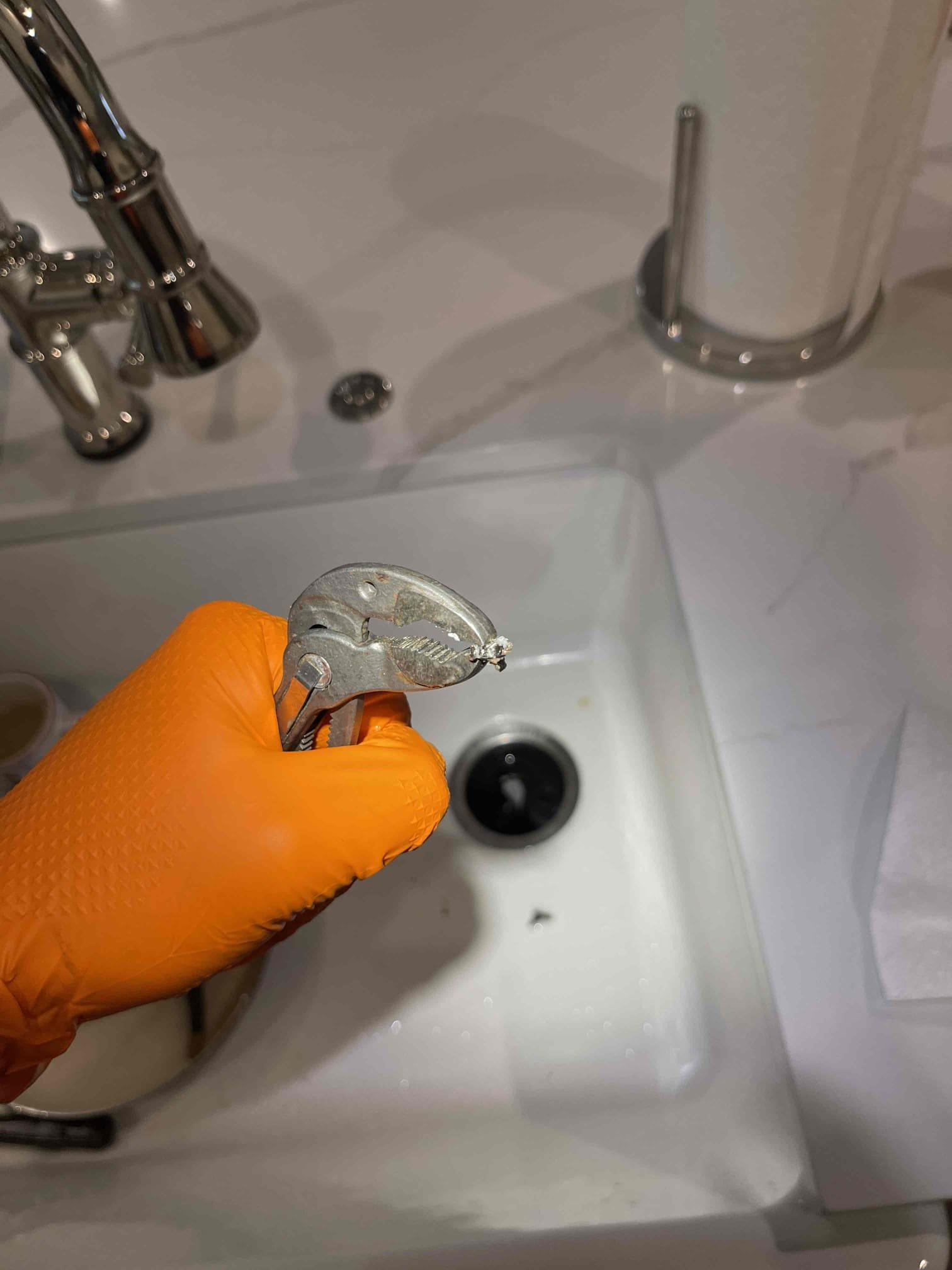 Came out for the disposal not working. Found it was making a loud noise because something fell inside 5e disposal and got stuck. Homeowner said the kitchen sink was also slow to drain sometimes which I did not notice on this visit when we ran water. We removed the trap and cleaned out the p trap and waste arm as there was a good amount of build up inside that I could see. Removed the broken piece that fell down inside the disposal and was making the noise when the blades were spinning. Disposal is now running correctly with no noise. We filled the sink basin up with water and let it drain to verify sink had no problems with draining. There is an AAV on the sink that may be occasionally getting stuck during periods of high use and mimicking a slow drain. Drain was working normally though after we cleaned the trap out. No further issue at this time. 