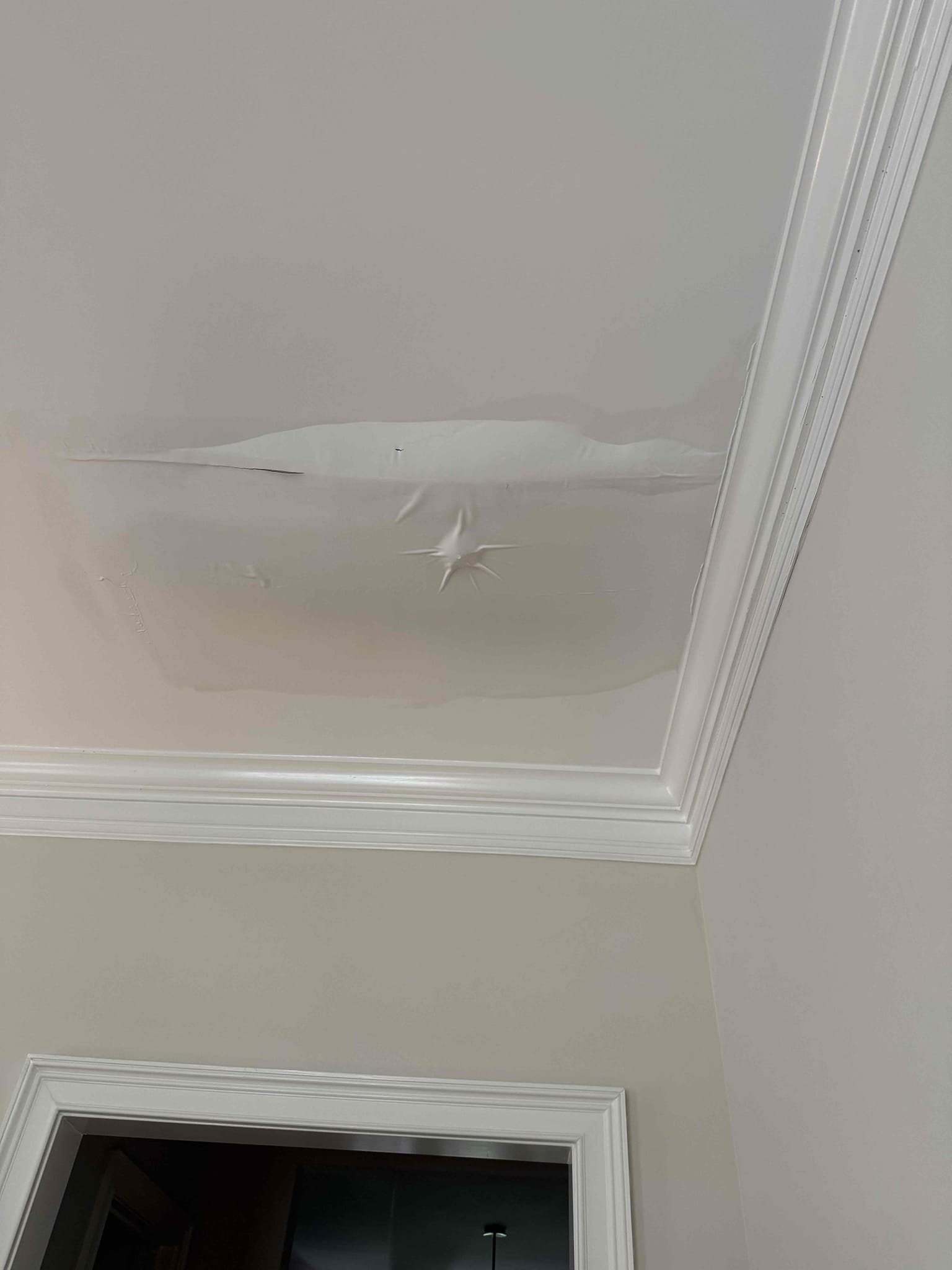 Water coming from ceiling upon arrival. Customer stated he came downstairs and noticed water dripping from the ceiling. After opening ceiling noticed a sudden pipe bust causing water damage. Informed customer we could replace that section of pipe. Gave customer estimate, customer approved estimate. Cut out section of pipe and replaced it with new copper, turned water back on to check for leaks and found no leaks. Provision will be in contact.