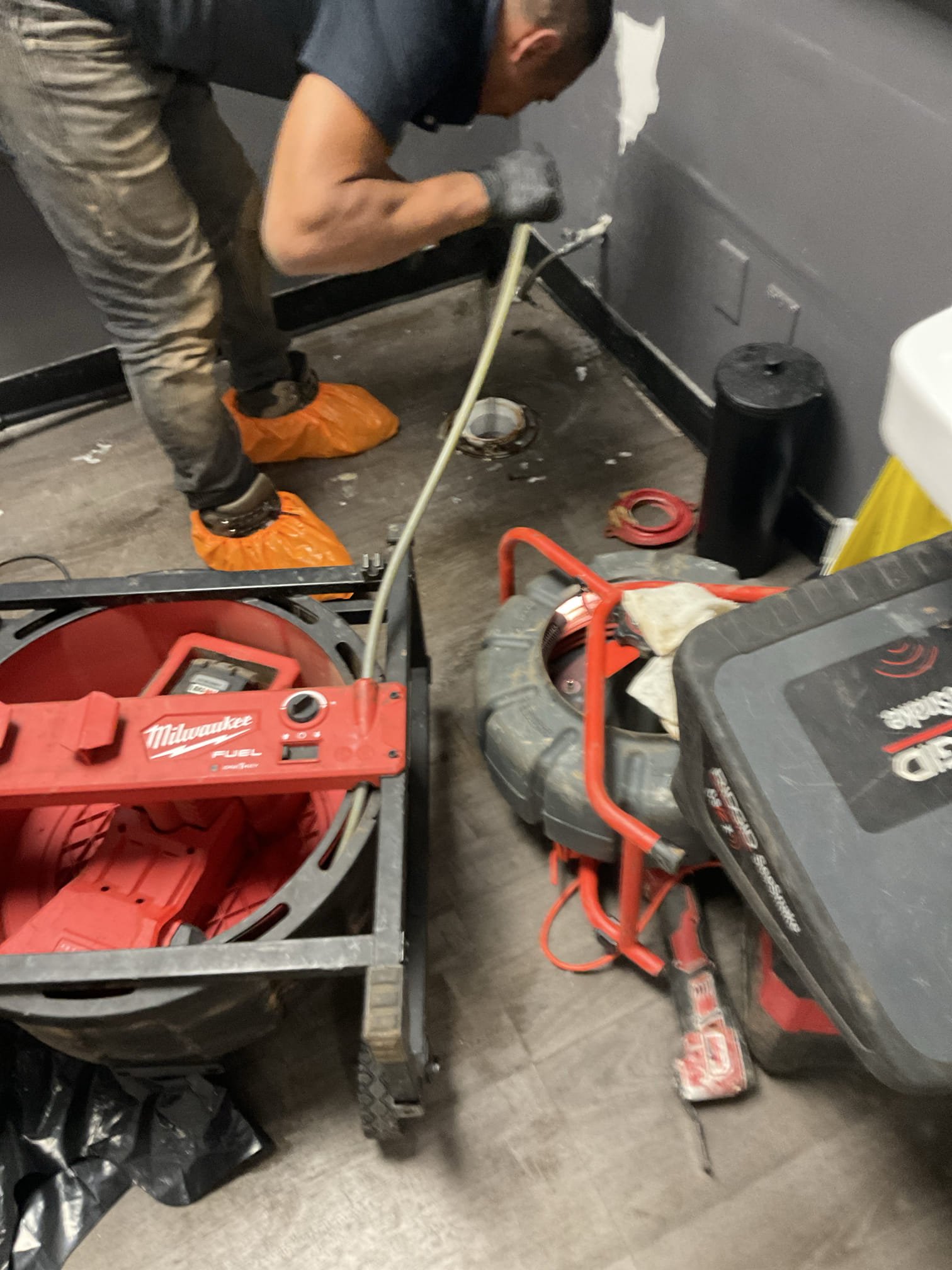 Sunday emergency plumbing service, problem found with main line back up with both man and woman’s restroom and shower , we removed men’s toilet , used snake cleared blockage , clog was about 15 feet away from the men’s toilet and appeared to be after both restroom. To fix this problem permanently will need cut some concrete replacing that belly section to make correct slope . 