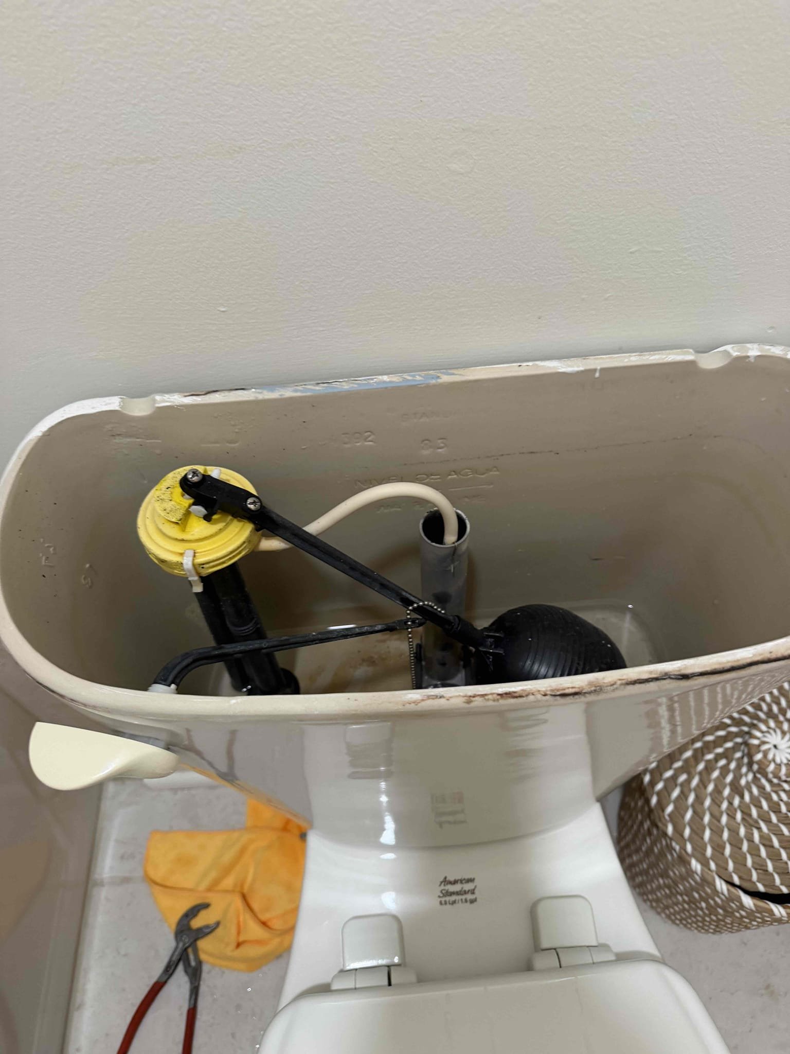 Customer stated that there was water around the toilet. Found water dripping from supply line and fill valve and recommend recommended to customer have toilet rebuilt. Rebuilt toilet by replacing supply line fill valve and flapper. Tested and no leaks were present at this time in toilet was working as it should. Cleaned up work area.