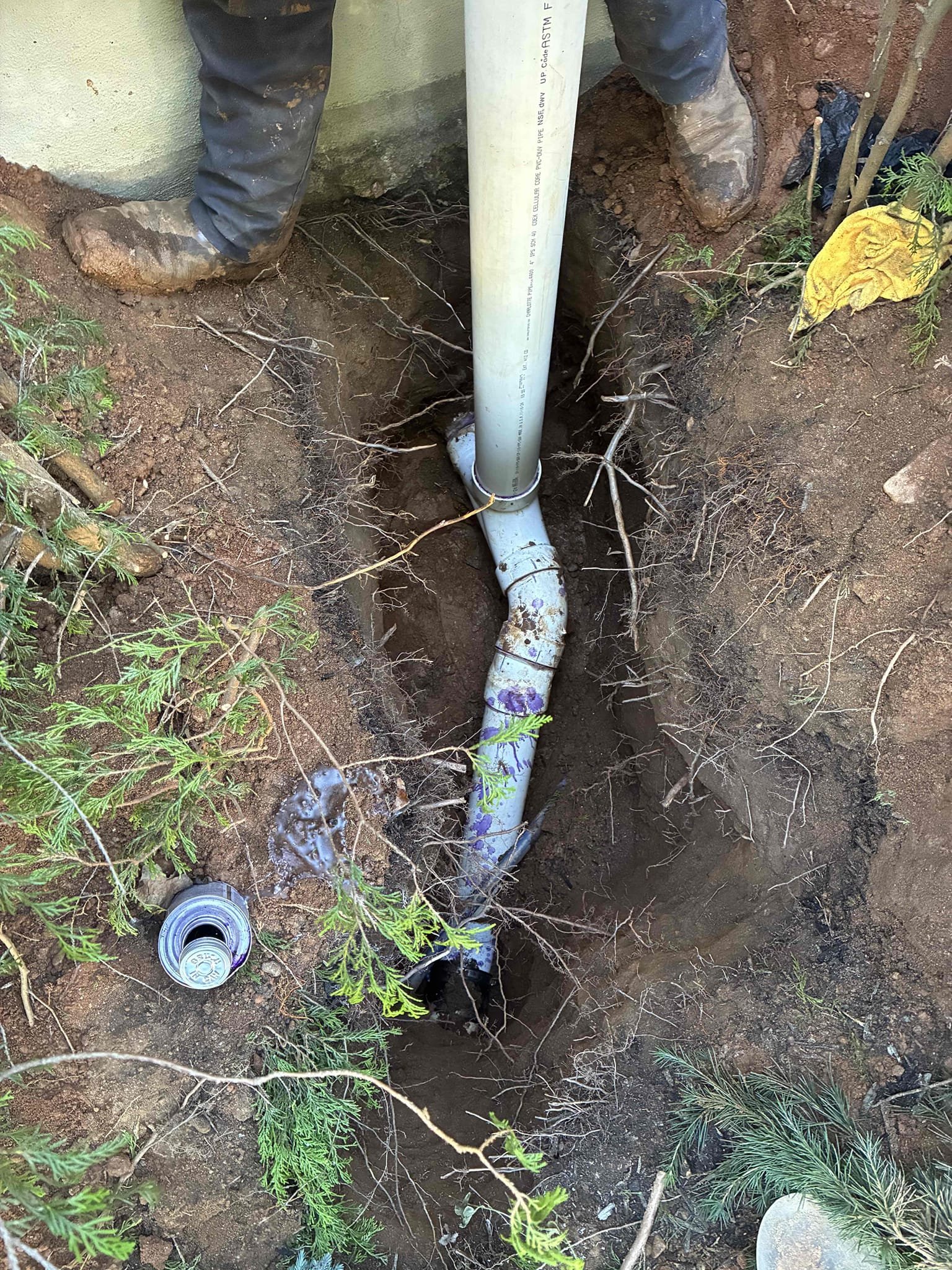 Snake drain and pulled root back from tailout. Dug up tailout and found 4” 8th bend was broken at hub and pipe has separated by about 4”. Cut out broke 45 and replace 5’ of 4” pvc. Also installed new two way clean out. Tested and left in good working order.