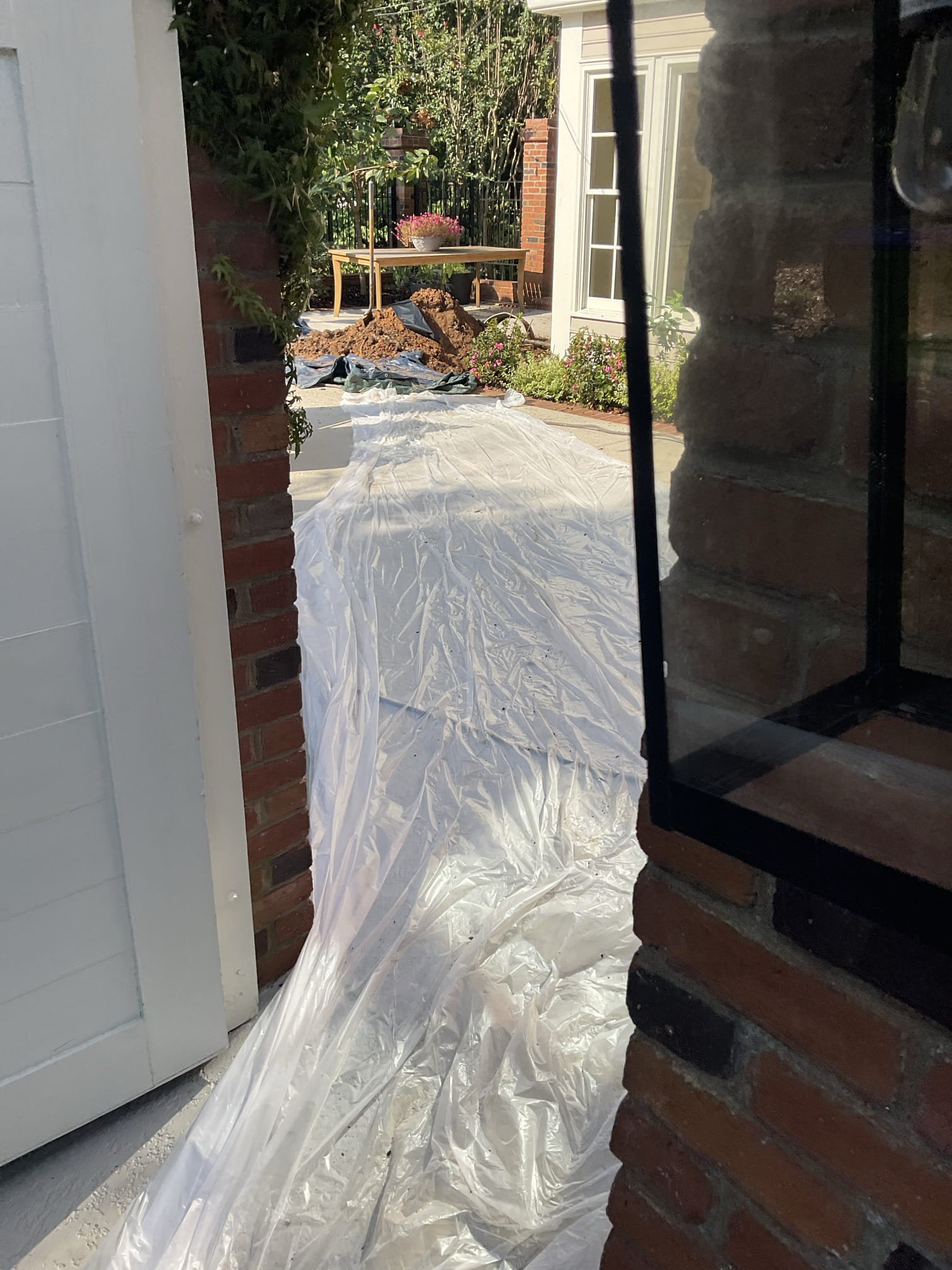 4 1/2 days work for installation of pvc drain line and two large water catch  basin installed with total 250 -300 feet 4” and 6” pvc pipe installed from driveway to back yard fence area . 