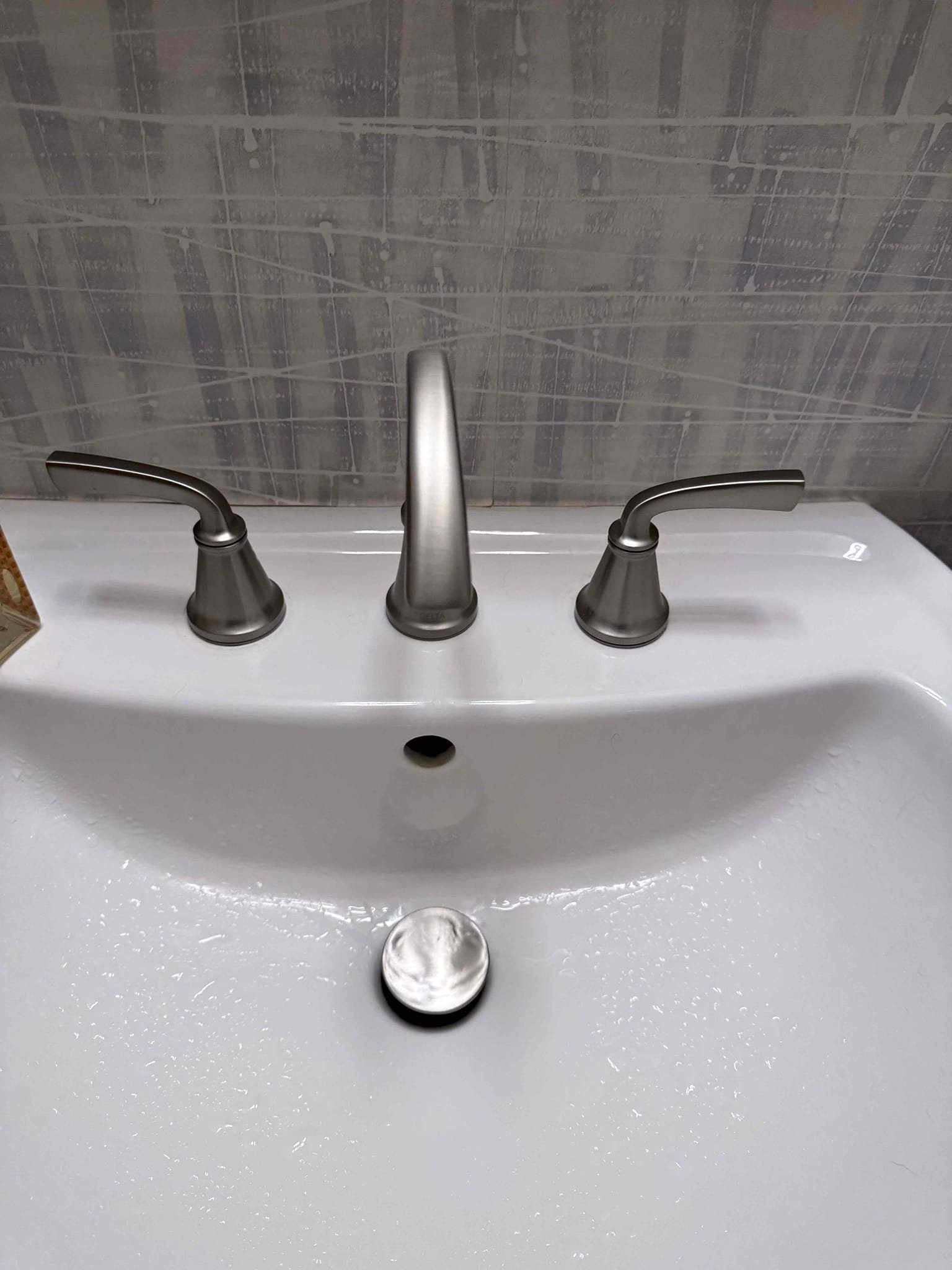 Upon arrival customer had a leaking faucet and low pressure on the hot side. After evaluation I informed customer the cartridge had gone bad on the hot side and gave customer estimate to replace both cartridges. Customer approved estimate found cartridges to be seized and would not budge so I informed customer we could change out the whole faucet. Customer approved estimate. Replaced old faucet with new Koehler wide spread faucet. After installing faucet checked for leaks and verified pressure was good on the hot side. Everything operating correctly and no leaks upon departure.
