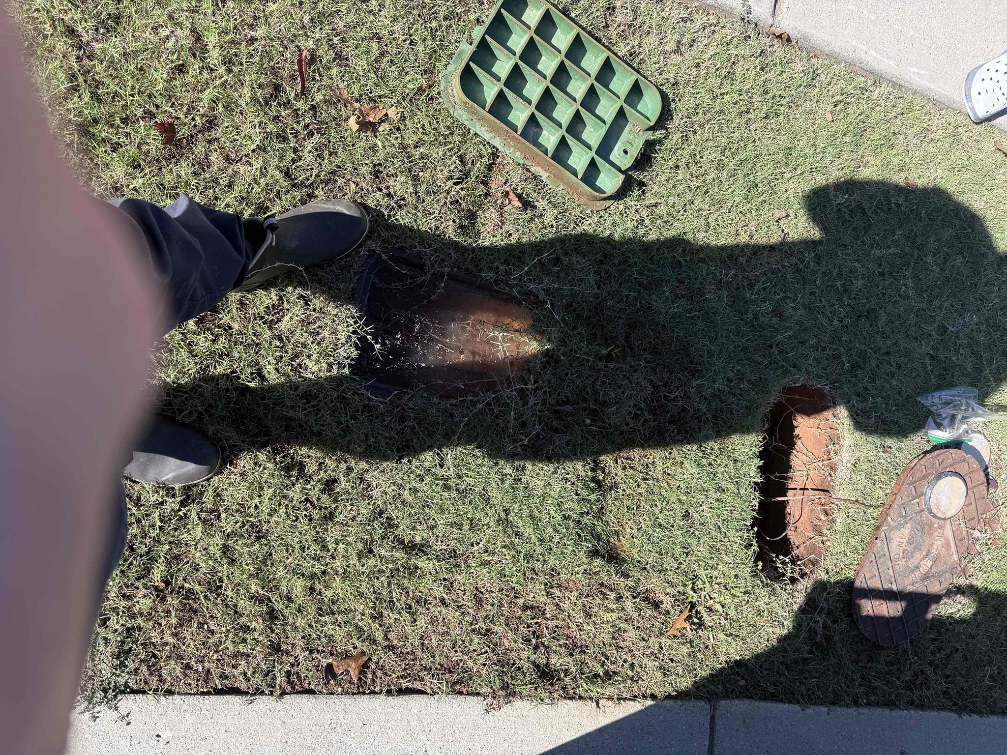 Upon arrival customer had a high water bill. I shut of main shut off valve inside the home and the meter was still spinning and full of water. Gave customer estimate to do an exploratory dig to attempt to find leak. Customer approved estimate. Dug up by meter and irrigation control box after digging and pumping water out of boxes I saw the irrigation control valve  spraying water from the top. I shut water off to irrigation from ball valve inside the box. Recommend customer to call irrigation company. Meter no longer spinning upon departure 