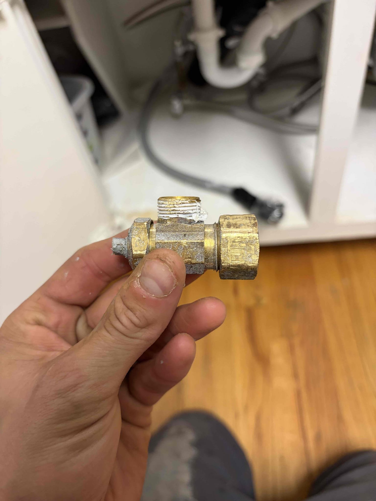 Replacement of one service stop valve for the dishwasher line
Upon arrival, I inspected the service stop valve and determined that the existing valve was an old-style compression, multi-turn valve that needed to be replaced.

The customer was also attempting to connect a dishwasher. The existing 3/8” compression connection did not match the dishwasher’s 7/8” connection. To complete the installation, either an adapter/speedy valve would have been required or the existing valve would need to be replaced with a new 3/8” compression stop valve. I installed a brand-new 3/8” compression stop valve to complete the plumbing portion of the project.

During the inspection, I also noted that the water heater is approximately 15 years old, with a manufacturer date of 2011, and is approaching the end of its expected service life. An estimate was provided to the homeowner for replacement of the water heater.

Additionally, while attempting to install the dishwasher, the customer applied Teflon tape 