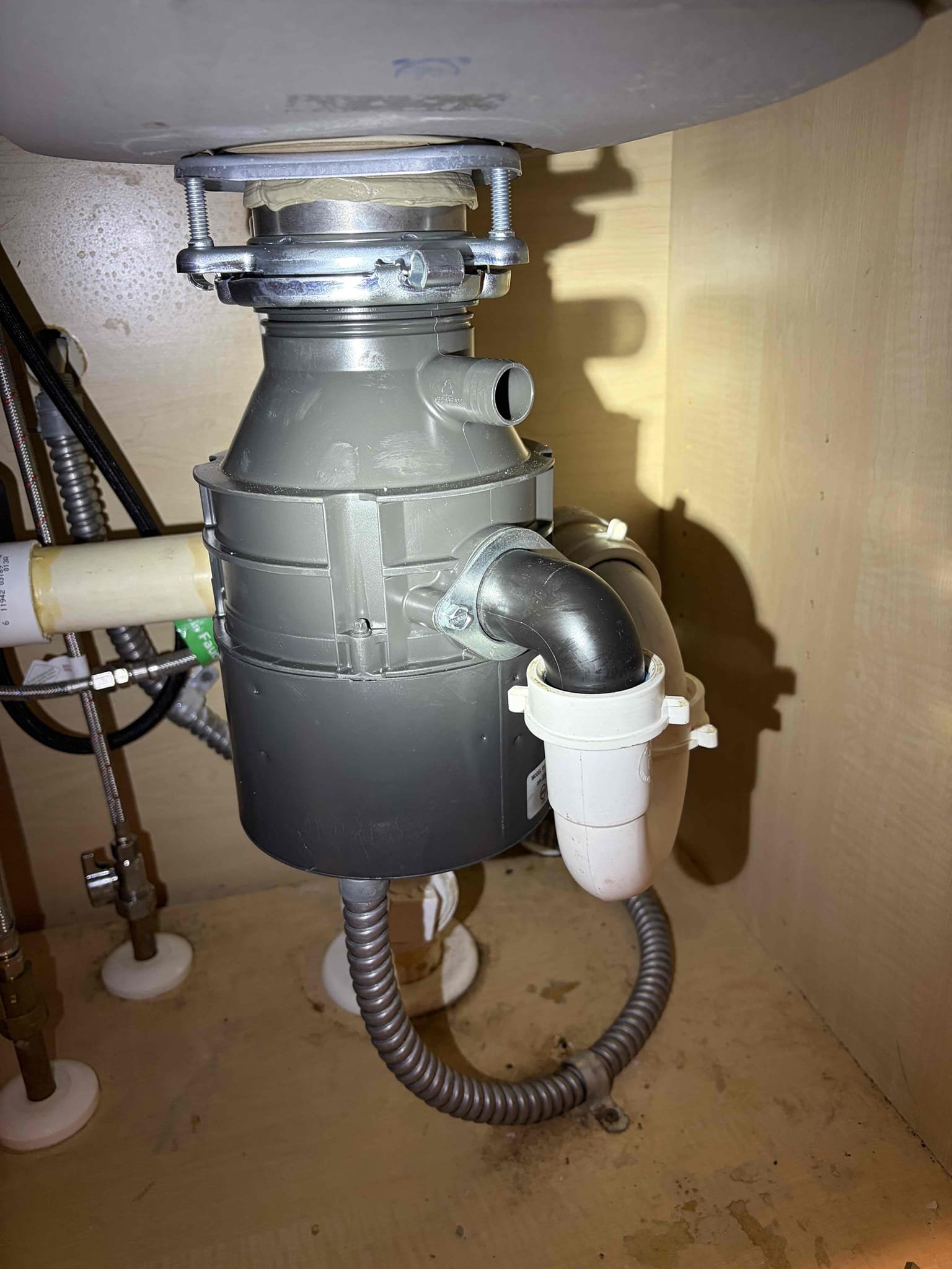 Replace a 1/3 hp garbage disposal with a 1/2 hp garbage disposal 

Dispatched to the property to diagnose and address a leaking garbage disposal. Upon inspection, the existing disposal was identified as a 1/3 HP unit. Due to the condition and performance of the existing unit, replacement was recommended with a higher-capacity 1/2 HP or 3/4 HP disposal. Customer elected to proceed with installation of a new 1/2 HP unit.

Electrical power to the disposal was disconnected and verified prior to beginning work. The existing disposal and sink strainer were removed. Installed a new 1/2 HP garbage disposal, new sink strainer, new wire nuts, and all necessary components and materials required to complete the installation.

All electrical connections were properly secured, and the disposal was reconnected to the existing electrical supply. System was energized and the disposal was tested for proper operation. All plumbing connections and the disposal mounting assembly were inspected under operat