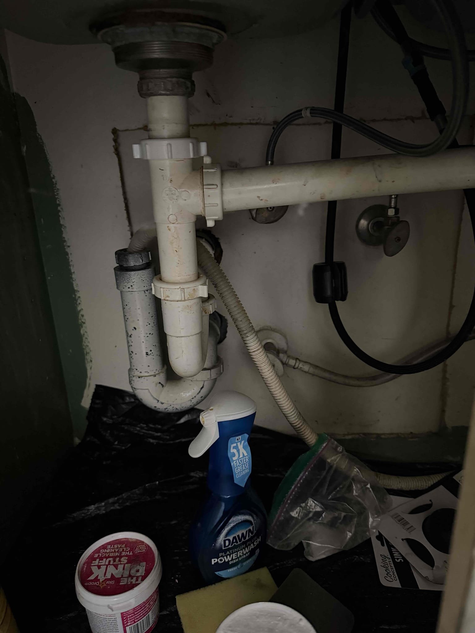 Upon arrival, customer states they’re experiencing no hot water. After inspection, noticed water heater was turned down to vacation mode. Turned water heater back up to a temperature. Water heater is lit and working properly. During inspection, noticed kitchen drain is leaking in wall. Informed customer, provided customer with estimates to repair leak. Customer approved estimate. Rerouted kitchen, drain through floor, and tied back onto existing two inch drain. Tested the system, no leaks at departure. System is draining properly at departure.