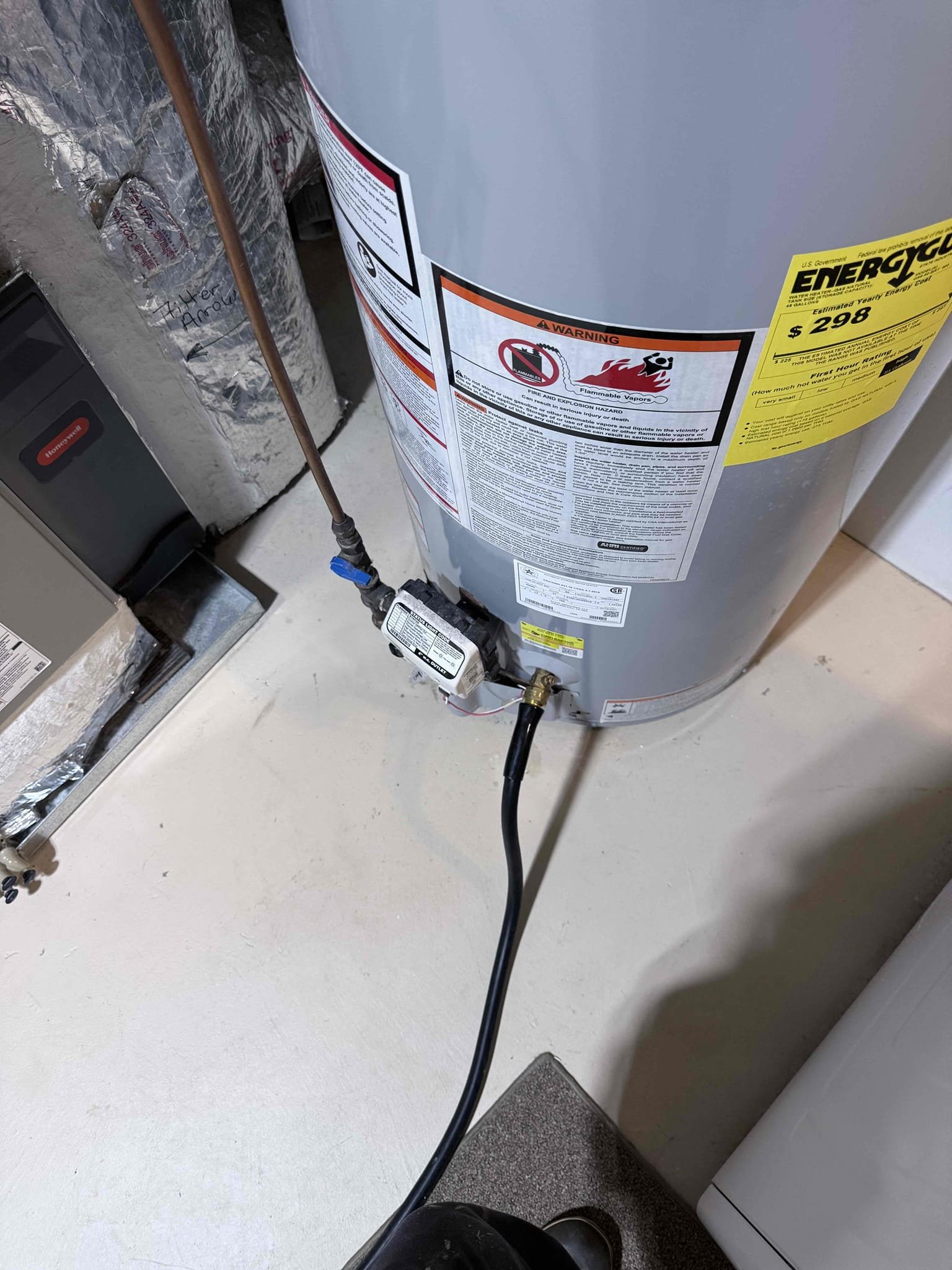 Upon arrival, the customer requested a water heater flush and replacement of the failed expansion tank. After evaluating the existing water heater, I advised the customer that, due to the age of the unit and the lack of documented maintenance history, flushing the water heater was not recommended. Instead, I recommended replacing the water heater and maintaining it according to the manufacturer's recommended maintenance schedule. Provided estimates for both flushing the existing water heater and replacing the unit. The customer elected to proceed with flushing the existing water heater and replacing the expansion tank. Shut off the gas supply to the water heater and performed the requested flush. Removed the existing expansion tank and installed a new expansion tank, securing it with a mounting bracket. After completing the flush, showed the customer the sediment removed from the water heater to demonstrate the buildup inside the unit. Refilled the water heater, restored the gas supply