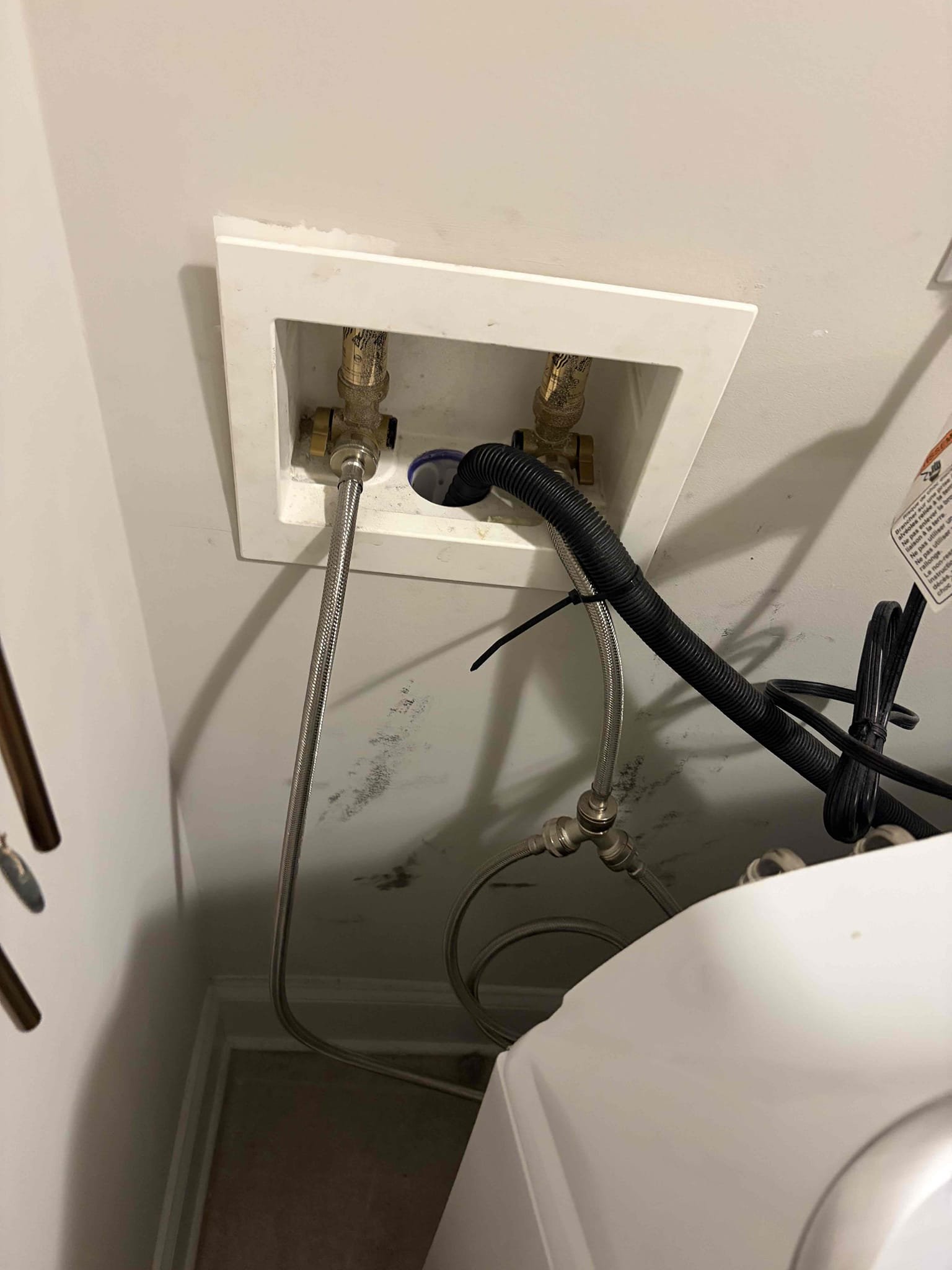 Upon arrival, customer states they believe there’s a water leak due to markings on wall. After inspection, noticed markings coming from hose rubbing on the wall. Informed customer.  Ran washer cycle, washer is draining and working properly at departure.