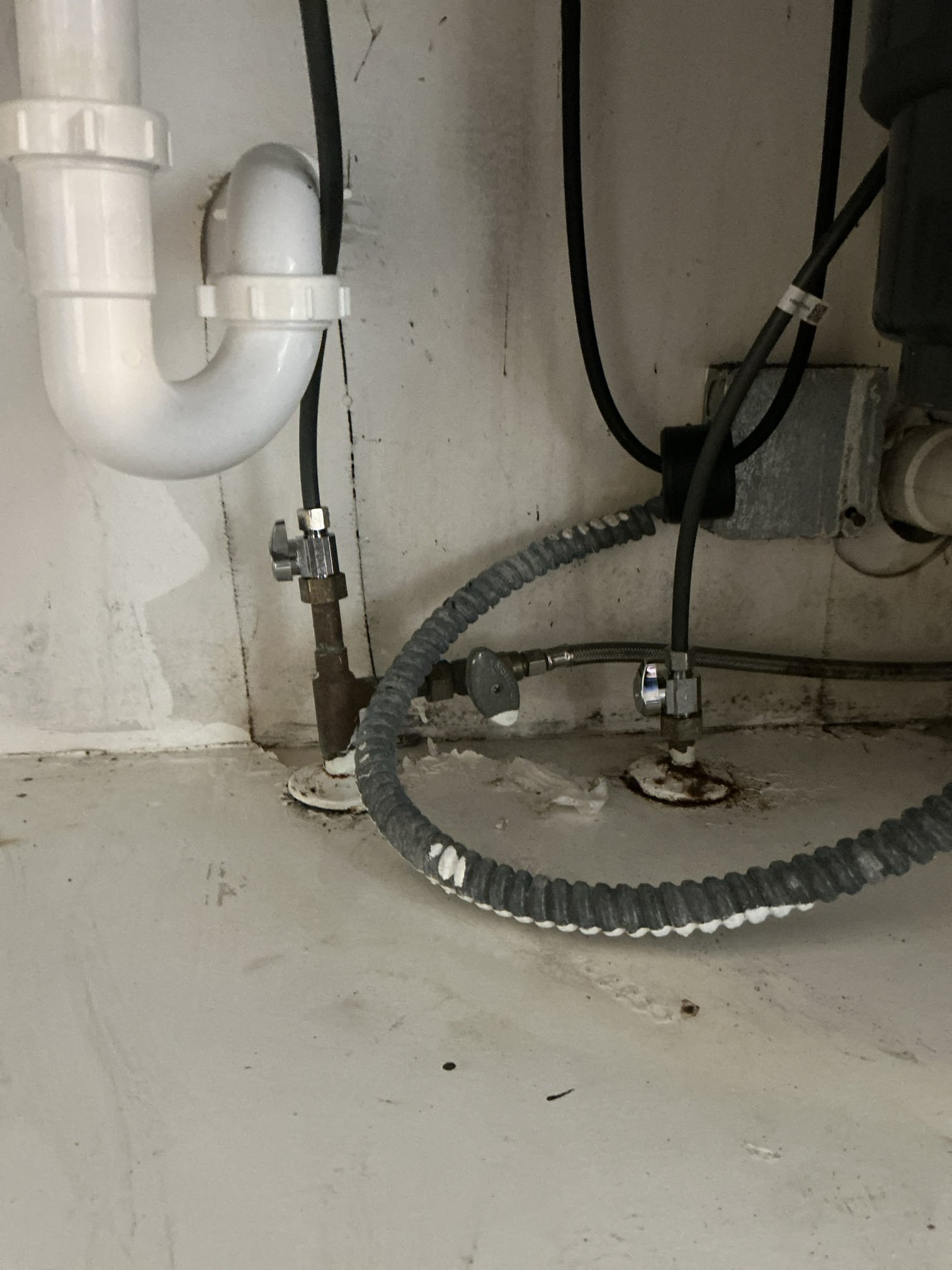 Diagnosed leak underneath kitchen sink. Found faucet to be leaking and following pipes down. Leaking on base and soaking wood area holding faucet. Shut off water to home, removed old kitchen faucet, installed new kitchen faucet and as a courtesy replaced both hot and cold shut off valves. Tested new faucet for proper operation. No leaks found from faucet. Also noticed since wood below is still soaked, may be some residual water that drips down as it drys out. Also sealed counter to sink to not allow any water into cabinet below. 

Customer did not want me to check heater and water pressure today