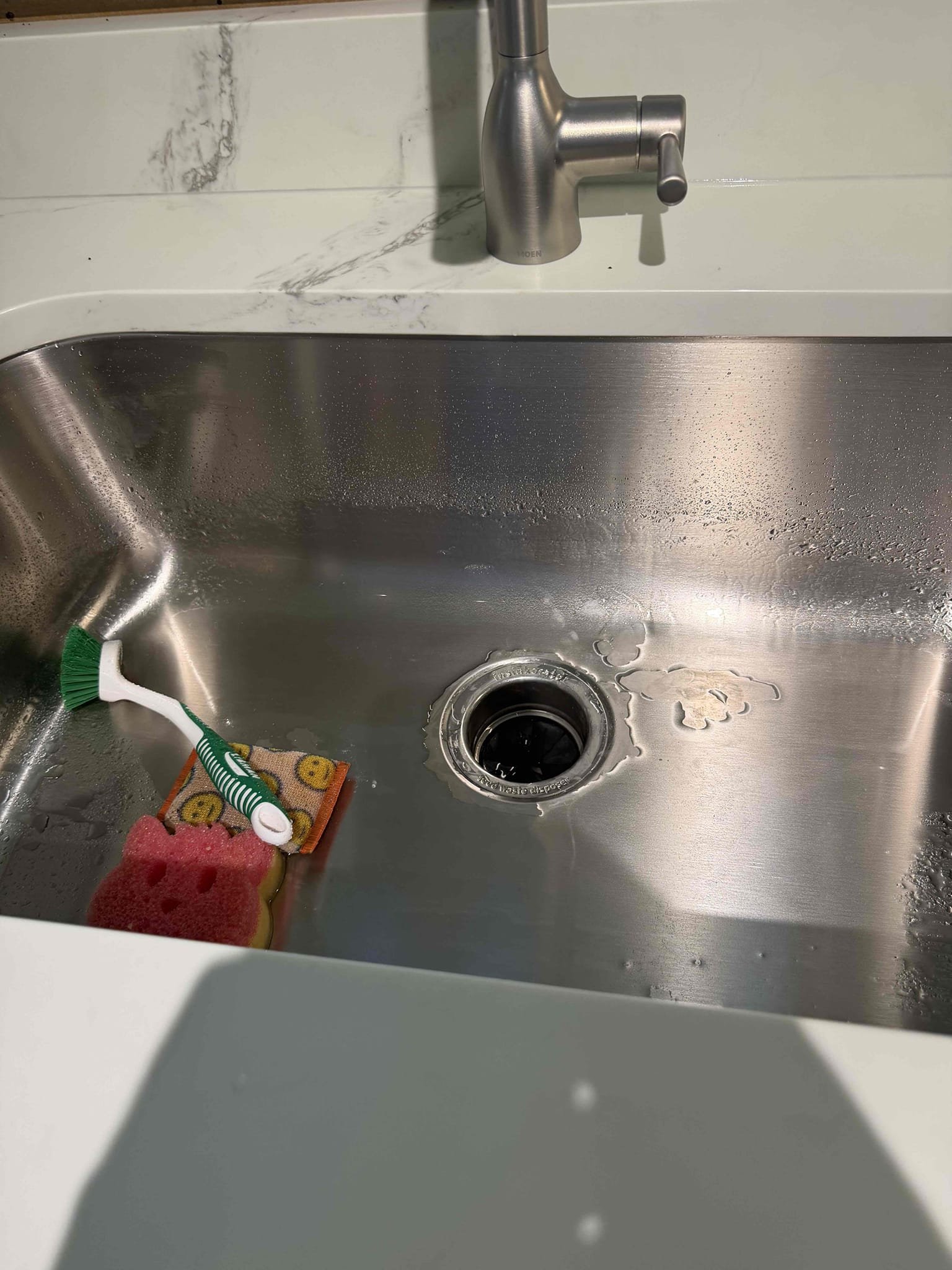 Upon arrival, customer recently had new sink installed. Customer is requesting we remove garbage disposal and faucet and install onto new sink. Provided customer estimate, customer approved estimate. Installed new faucet and garbage disposal. Kitchen sink is working properly at departure. No leaks at departure.