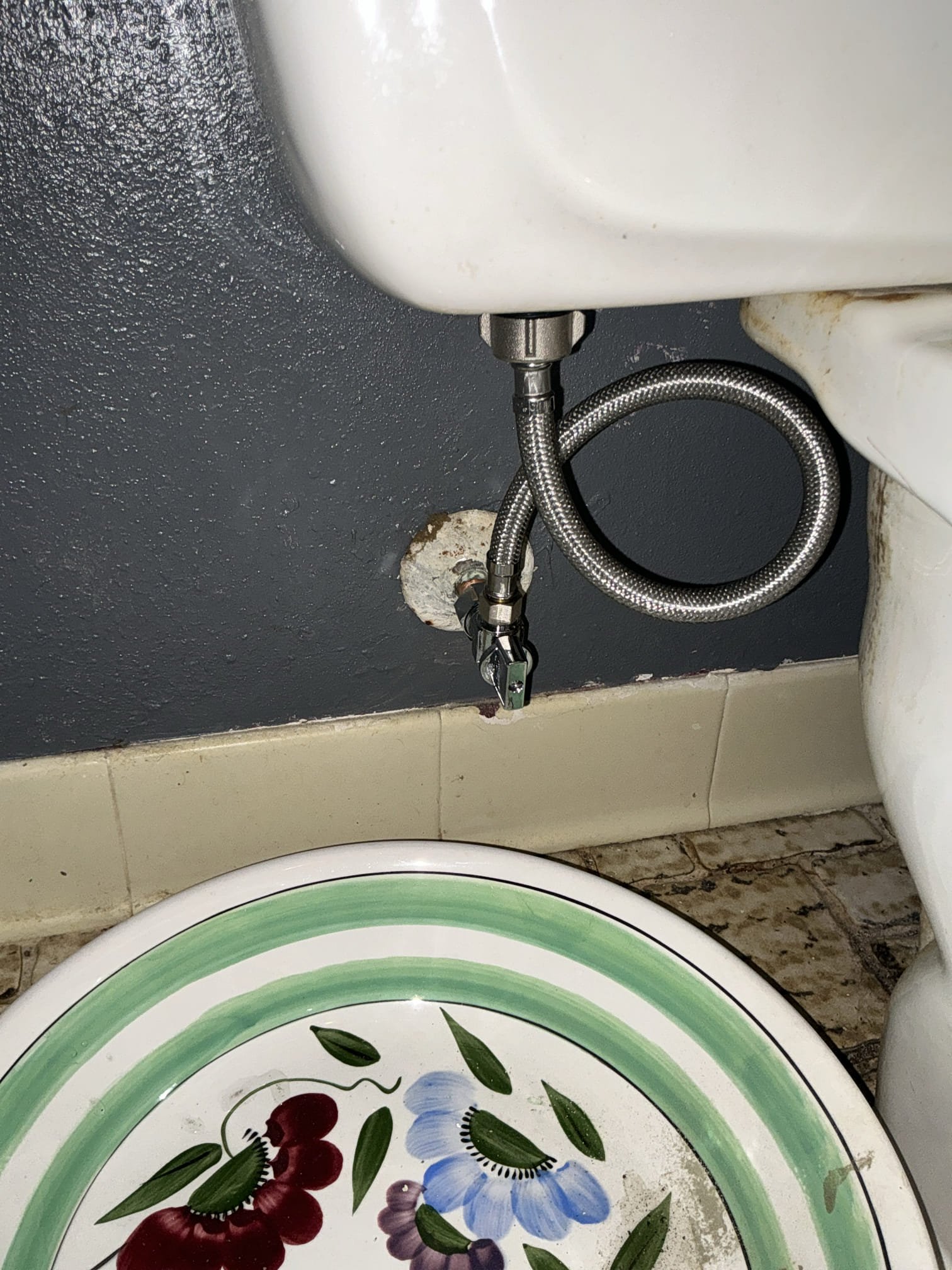 Diagnosed 2 non working multi turn valves for toilet downstairs and upstairs. Shut off water to home and drained system. Cut out and replaced both valves with new 1/4 turn valves and also installed new supply lines. Tested for proper operation and found no leaks. Cleaned workspace 