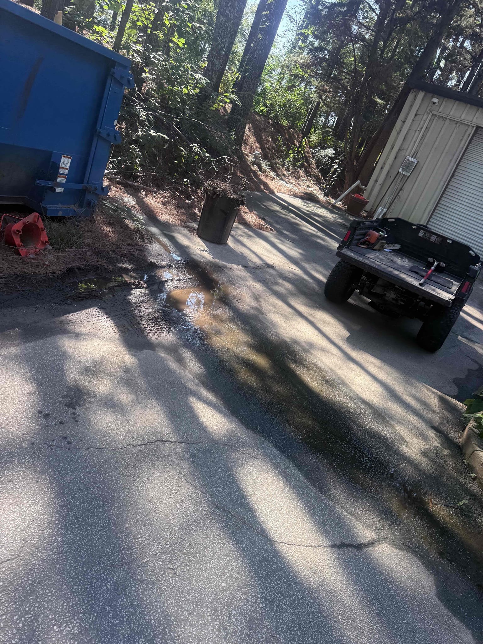 Upon arrival, the customer reported that a tree had fallen on the property and that water was observed accumulating in the parking lot the following day. The customer was concerned about a potential underground water leak. I explained that we could perform a leak search to evaluate the situation, and the customer approved the estimate. During the evaluation, I inspected the incoming water service to the building and observed that the service line entering the building appeared to be copper, while the piping extending from the water meter appeared to be PVC. I checked the flow rate and found that it was registering zero at the time of inspection. Based on the available findings, I was unable to confirm the source or exact location of the water accumulation. I discussed the next steps with the customer and recommended shutting off the irrigation system for several days to determine whether the standing water in the parking lot begins to recede. If the area dries up, the customer should t