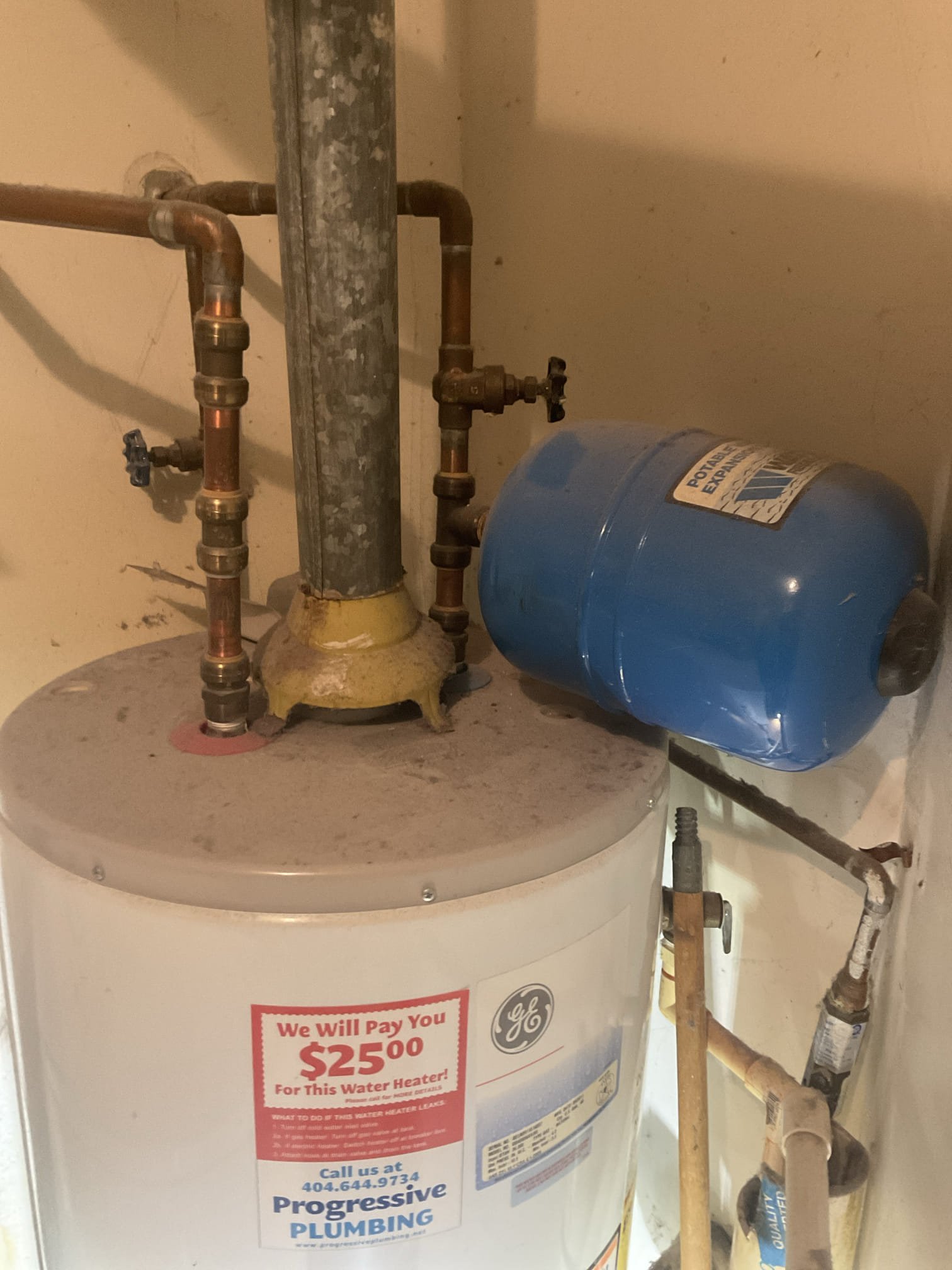 Could not determine the leak source , recommend water restoration company 
Also quoted water heater replacement.