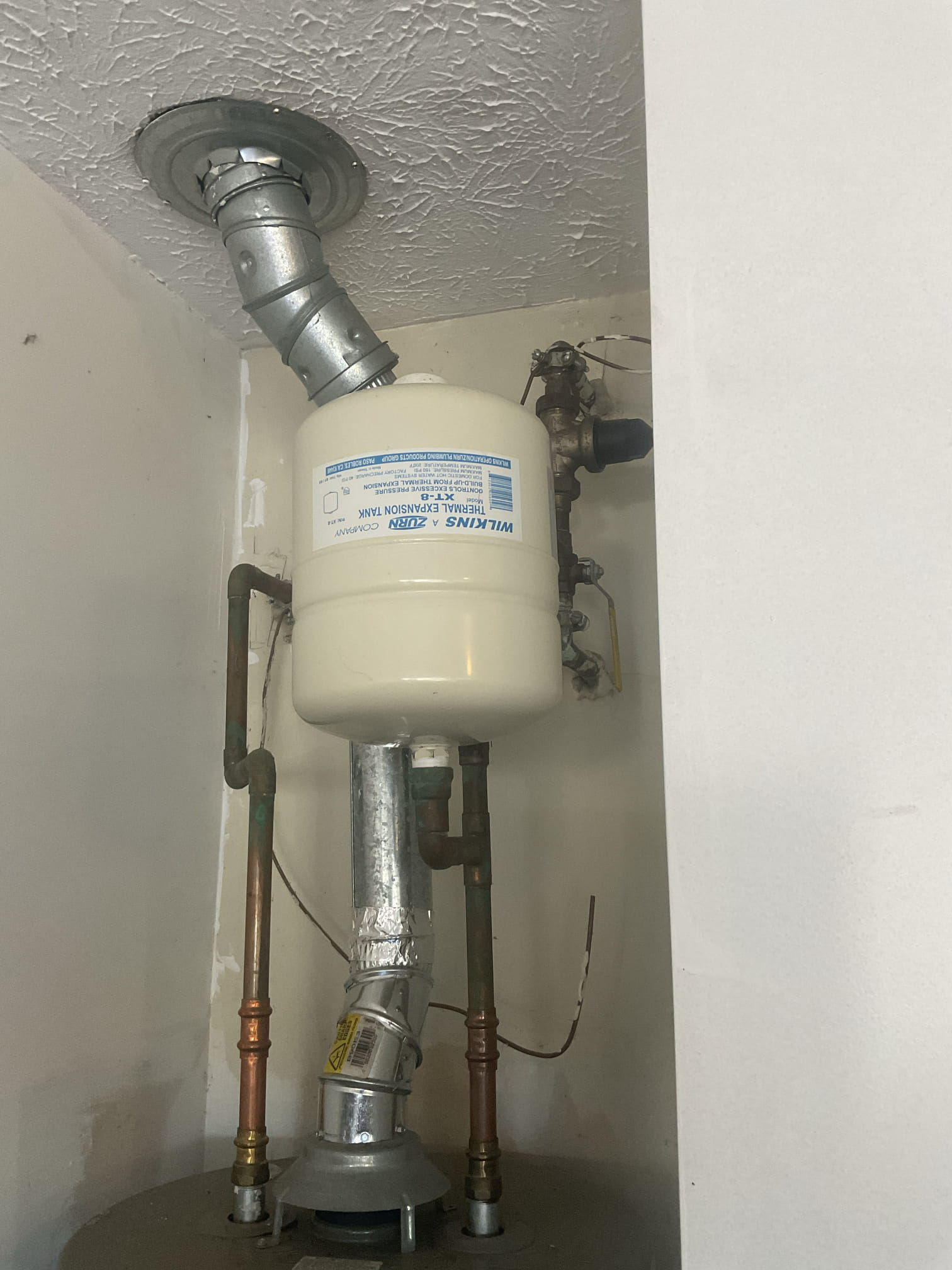 Replaced a leaking water heater drain valve with customer supplied, discussed and signed up membership with customer, left membership booklet with customer today . 
