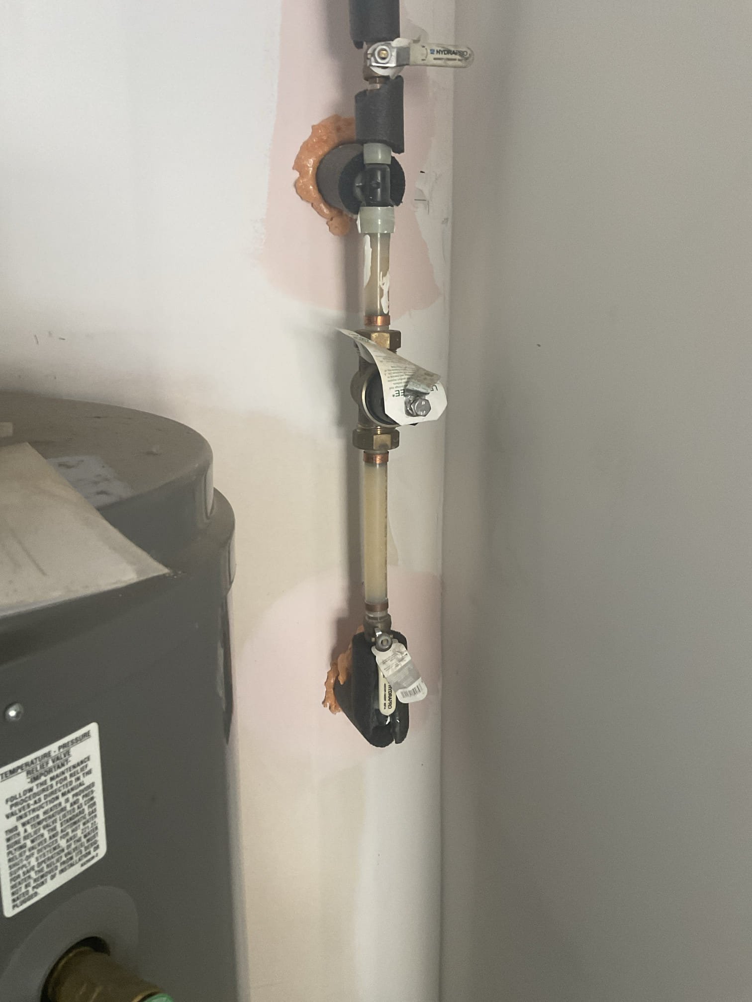 Today we opened wall behind washer on second floor , replaced clogged 2” pvc p trap and also replaced bad Prv behind water heater in garage , one year warranty 