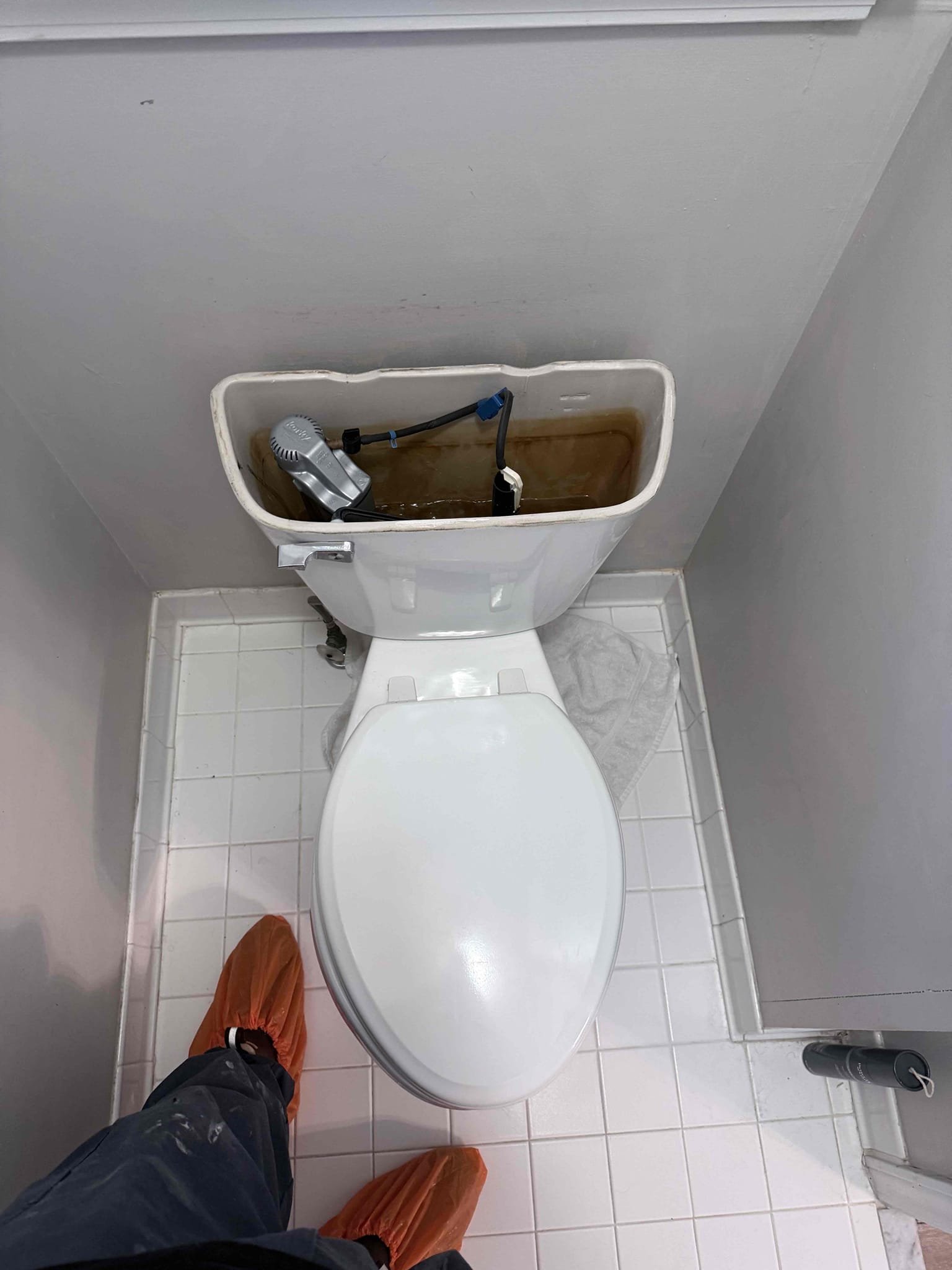 Upon arrival, the customer stated that the toilet was continuously running and leaking water from the tank-to-bowl bolts. After evaluating the toilet, it was determined that repairs would be necessary to address the existing issues. Discussed two available options with the customer: performing a major toilet rebuild, which would include replacing the flush valve, flapper, fill valve, and braided water supply line, or removing the existing toilet and installing a new dual-flush, comfort-height toilet. After reviewing the options, the customer elected to proceed with the toilet replacement.

Began by shutting off the water supply to the existing toilet and disconnecting the water supply line. Removed the existing toilet and inspected the closet flange for visible damage or deterioration. The flange was found to be in good condition and suitable for reuse. Removed the old wax ring and existing closet bolts from the flange to prepare the mounting surface for the new toilet installation.

A