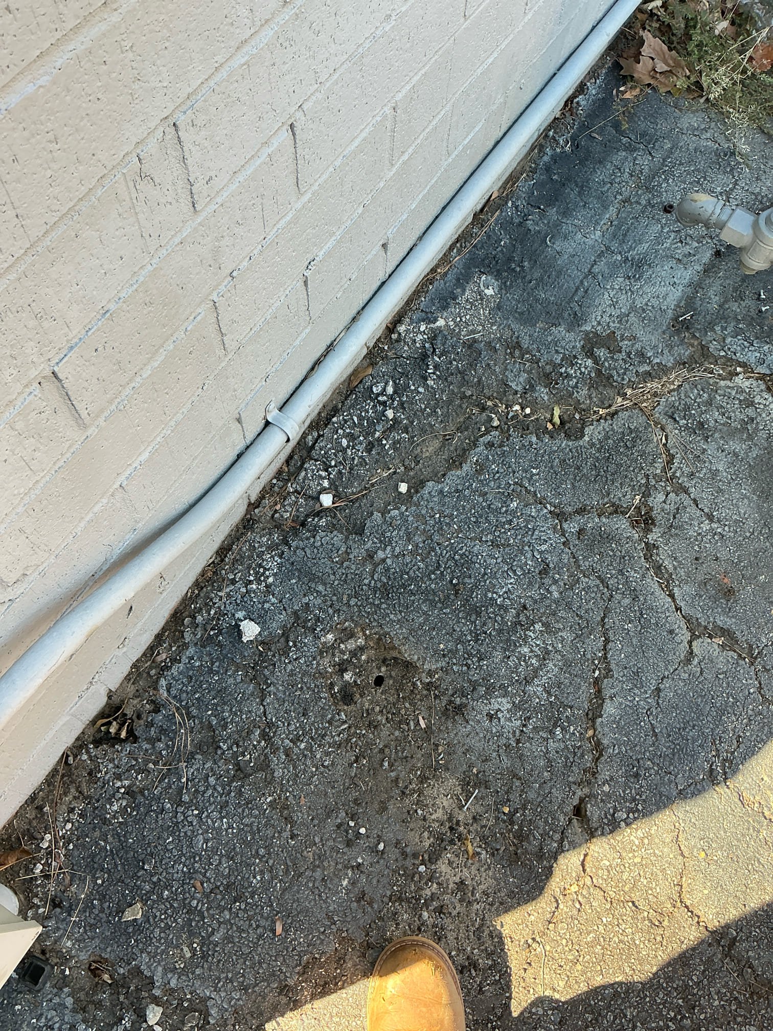 Found leak on exterior gas line going into asphalt. Cut gas line down to asphalt and capped gas off. Customer does not know where it could go. Customer will call if a new line is needed. Lit water heater upon completion. Tested and left in good working order.