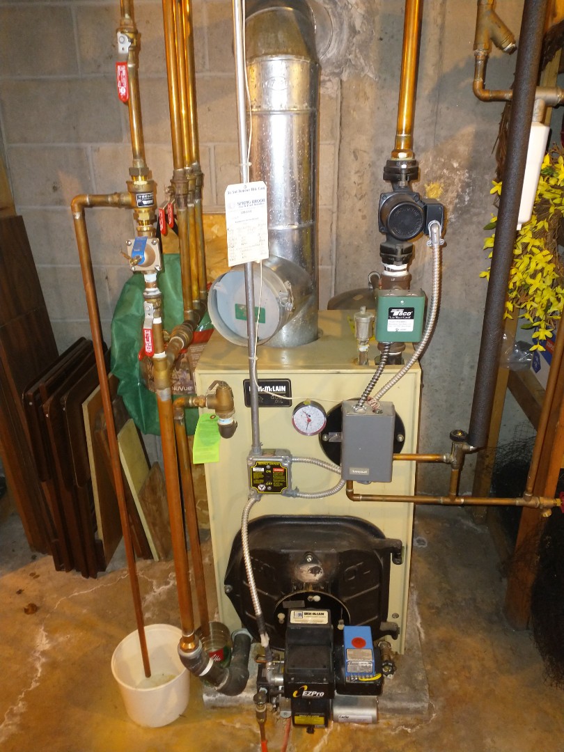 Performing annual on a Weil McLain oil boiler with a Carlin burner. 
