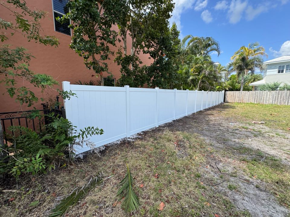 Boca Raton, FL - In Boca Raton, FL, we removed 130 feet of old chain link fencing and replaced it with 130 feet of 6-foot white privacy vinyl to create a clean, pool-code-compliant barrier. We also handled the permit process to make things easy for the homeowner. At Top Rail Fence, we’re all about smooth installs, safety, and fences that look as good as they perform.
