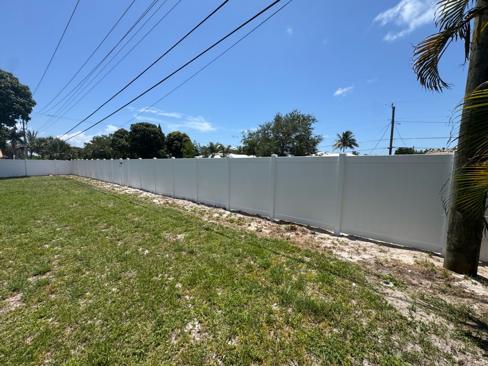 Boca Raton, FL - In Boca Raton, FL, we removed 110 feet of old 6-foot chain link fencing and replaced it with 110 feet of 6-foot white privacy vinyl and one gate. We also managed the entire permit process through the City of Boca Raton Building Department to keep things smooth for the homeowner. 