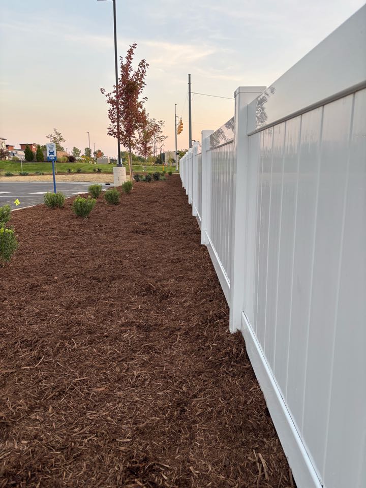 Holland, MI - 4’H white vinyl privacy fence for the Culver’s restaurant!