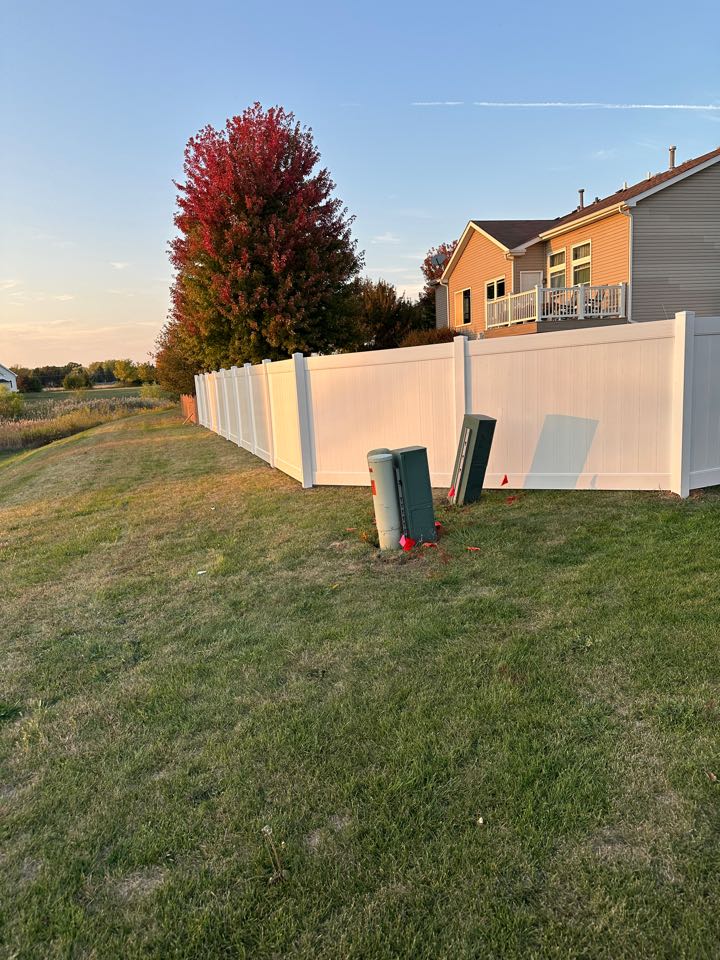 Plano, IL - Customer in Plano wanted a fence for her dog. She chose to move forward with Top Rail Fence. We installed 6’ tall white privacy vinyl. She and her dog are very happy with the new fence. 