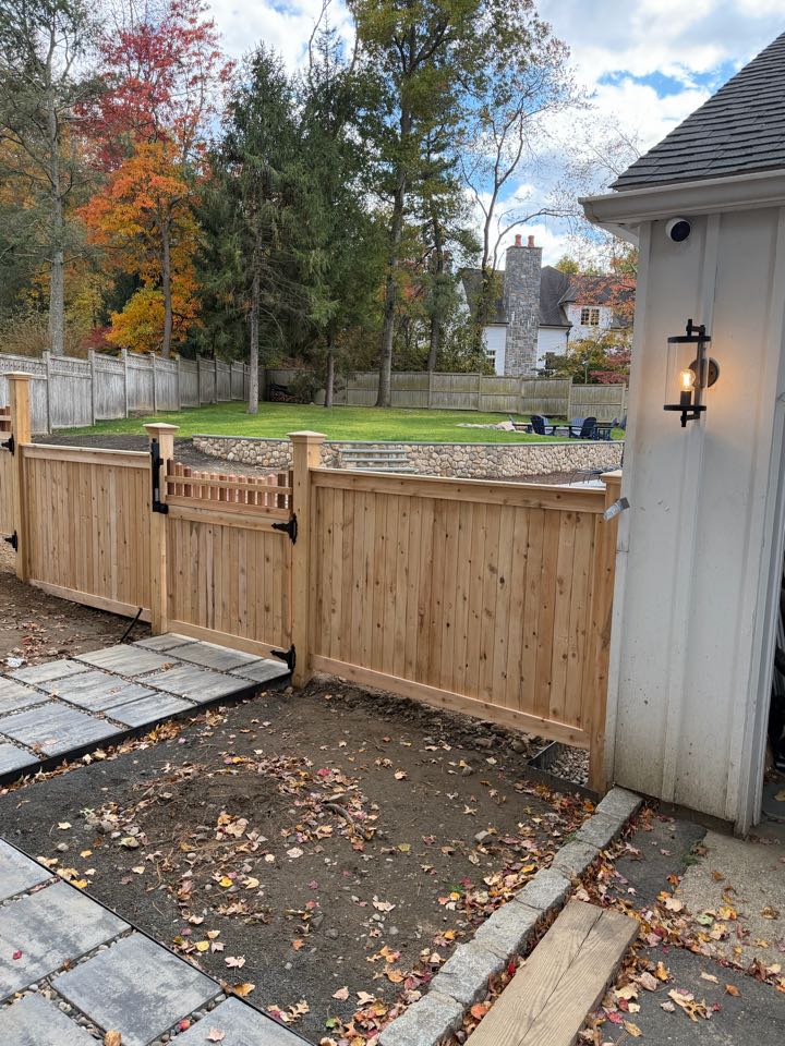 Just finished a beautiful new cedar fence with custom picket topped gates in Stamford!  Just finished a beautiful new cedar fence with custom picket topped gates in Stamford!