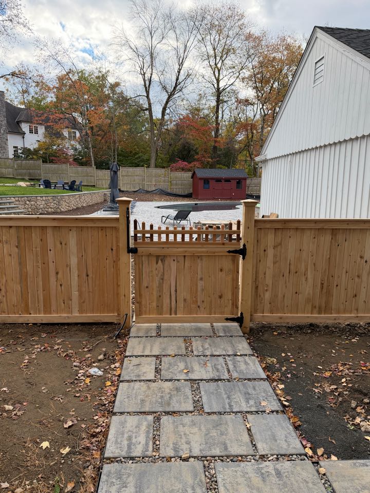 Just finished a beautiful new cedar fence with custom picket topped gates in Stamford!  Just finished a beautiful new cedar fence with custom picket topped gates in Stamford!
