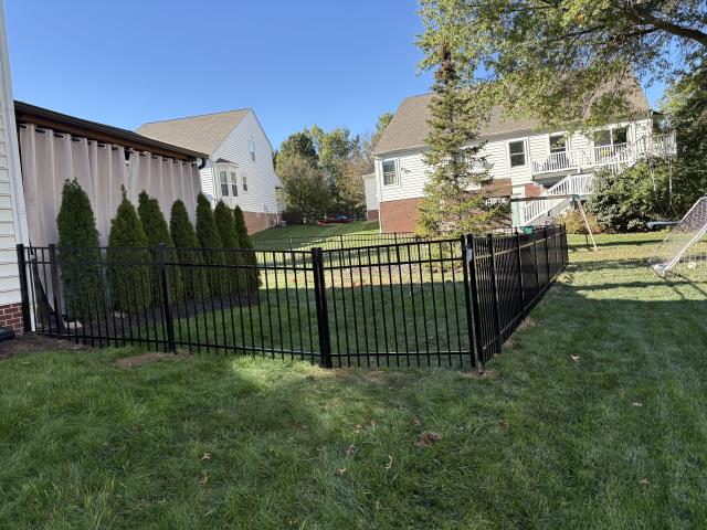 223 feet of 4' high black aluminum fence installed in Westerville, OH. 