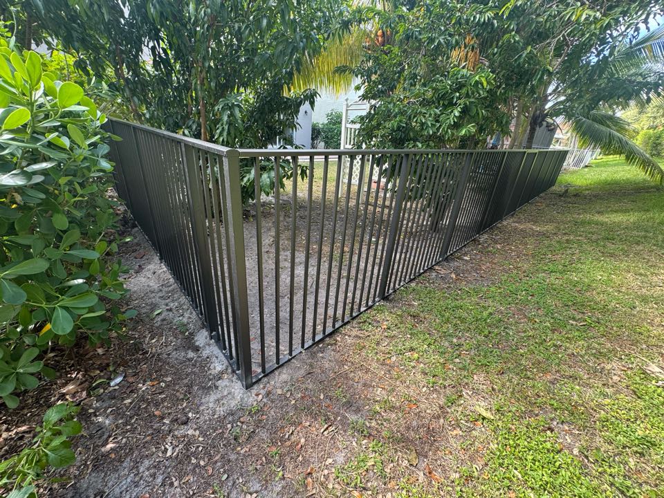 In the Nautica Isles gated community in Greenacres, FL, we installed 120 linear feet of 5ft tall bronze aluminum fencing with two gates for a family who just moved into their new home and needed a safe space for their dog. We assisted with the HOA approval and handled the entire permit process from start to finish. The result is a clean, durable, and HOA-compliant fence that fits perfectly with the community’s style.