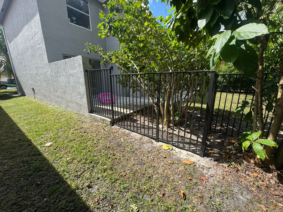 In the Nautica Isles gated community in Greenacres, FL, we installed 120 linear feet of 5ft tall bronze aluminum fencing with two gates for a family who just moved into their new home and needed a safe space for their dog. We assisted with the HOA approval and handled the entire permit process from start to finish. The result is a clean, durable, and HOA-compliant fence that fits perfectly with the community’s style.