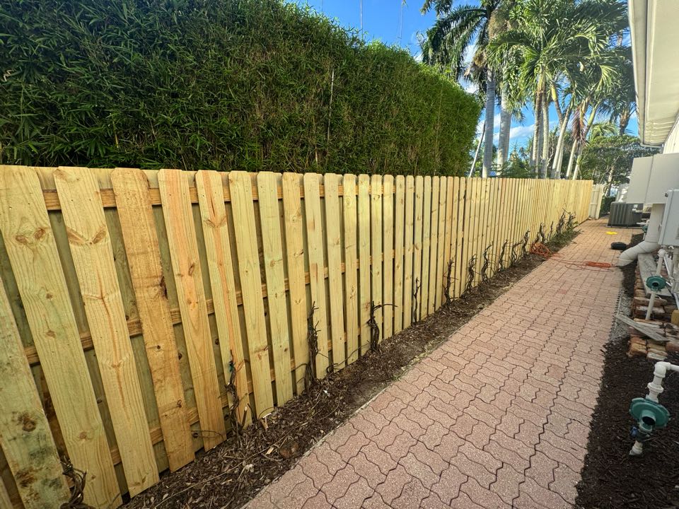 Bay Village, North Palm Beach, FL
We removed 62 feet of old, rotted wood fence and installed a new shadowbox wood fence built to meet pool safety code. Our team also assisted the homeowner with their HOA application and handled the entire permit process from start to finish. 