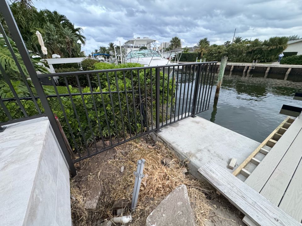 On Singer Island, we installed 160 linear feet of 4ft tall bronze aluminum fencing with two gates at a beautiful waterfront home. This pool barrier fence was completed for one of our luxury home builder partners and designed to meet all pool code requirements while maintaining a clean, upscale look that complements the property’s coastal setting.