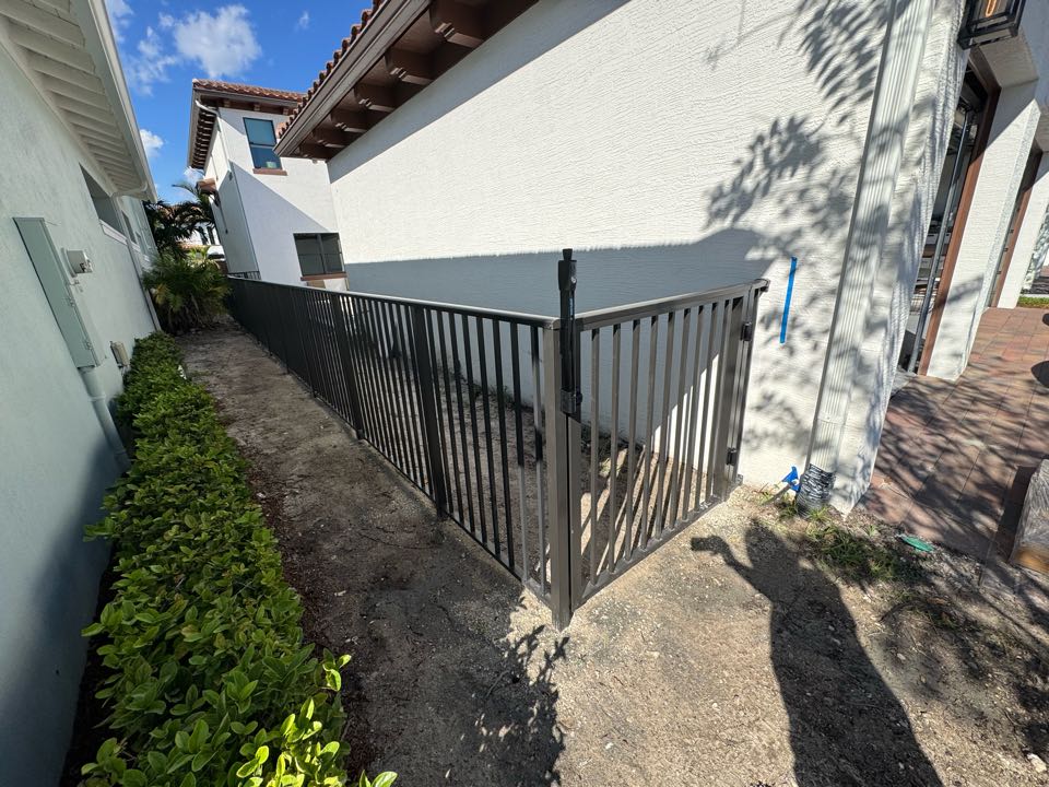 In the Alton community of Palm Beach Gardens, we installed a 4ft tall bronze aluminum fence with two pool code compliant gates for a customer’s new pool. Our team handled the entire permit process to make things seamless from start to finish. The end result is a clean, durable, and HOA-approved fence that adds both safety and style to the backyard.