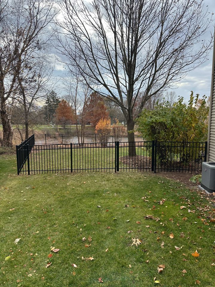 Naperville, IL - Customer in Naperville finally decided to fence their yard after 10 years. We installed 4’ black aluminum and they and the dogs love it. 