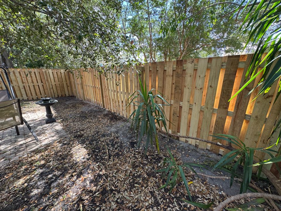 In the Gardens of Woodberry HOA in Palm Beach Gardens, FL, we replaced an old wood fence with a brand-new shadowbox fence in the backyard and added a wood-grain tan vinyl gate at the front of the home. Our team handled the entire permit process and assisted the homeowner with their HOA approval to keep everything smooth and compliant. 