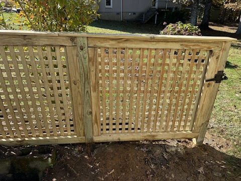 Signal Mountain, TN - Custom Wood Lattice Fence Installation on Signal Mountain, TN  Top Rail Fence Chattanooga recently completed a custom wood lattice fence on Signal Mountain, TN, designed to match the homeowner’s exact vision for a decorative and functional backyard feature. This handcrafted lattice-style fence adds privacy while maintaining an open, airy look — perfect for enhancing outdoor living spaces in the unique mountain terrain. Built with precision and tailored to the customer’s specifications, this decorative wood lattice fence brings both charm and craftsmanship to the property.  If you’re looking for a custom wood fence on Signal Mountain or anywhere in the Chattanooga area, Top Rail Fence Chattanooga delivers beautiful, made-to-order results that stand out.