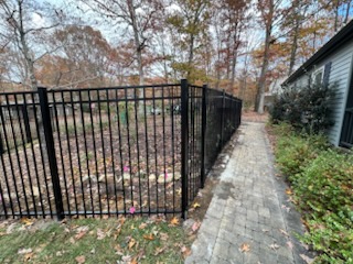 Top Rail Fence Chattanooga recently installed a 6-foot flat-top ornamental aluminum fence on Signal Mountain, TN to fully enclose a backyard with strength, style, and long-lasting durability. The customer chose our team based on our 5-star reviews, reputation for quality, and professional service.

We carefully aligned the fence along an existing paver footpath, creating a clean, seamless transition that highlights both the hardscape and the new fence line. This ornamental aluminum system provides excellent security while maintaining an open, elegant look—perfect for Signal Mountain’s scenic properties.

For homeowners seeking a high-quality ornamental aluminum fence in Signal Mountain, Top Rail Fence Chattanooga delivers precision craftsmanship, premium materials, and impeccable results.