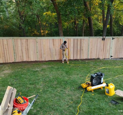 Kansas City, MO - Top Rail Fence completed a six-foot cedar "Cap and Trim" fence. 