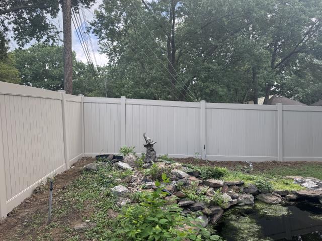 Kansas City, MO - Top Rail Fence installed a six-foot tan vinyl fence. 