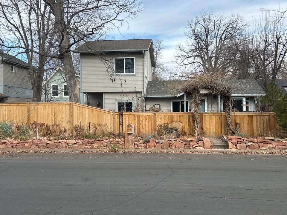 Fort Collins, CO - A beautiful new 6 foot tall cap and trim fence with an integrated pool pump shed. The fence is constructed out of 4 x 4 posts, 2 x 6 cap and 1x6 pickets.
