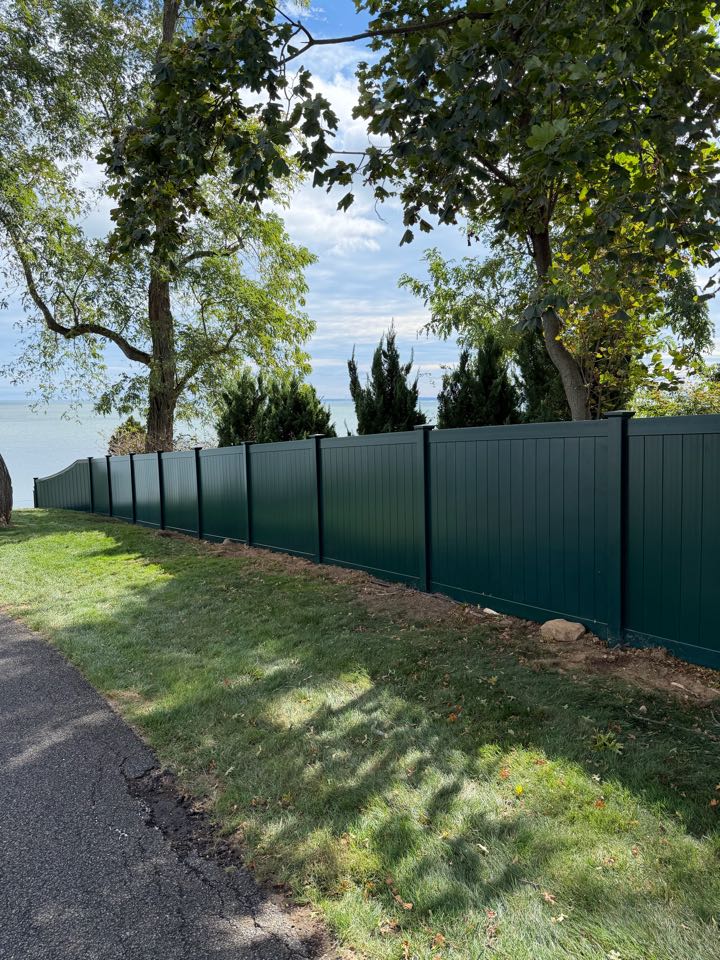 Stamford, CT - Just finished a beautiful Hunter Green vinyl privacy fence right on the Sound in Stamford!
