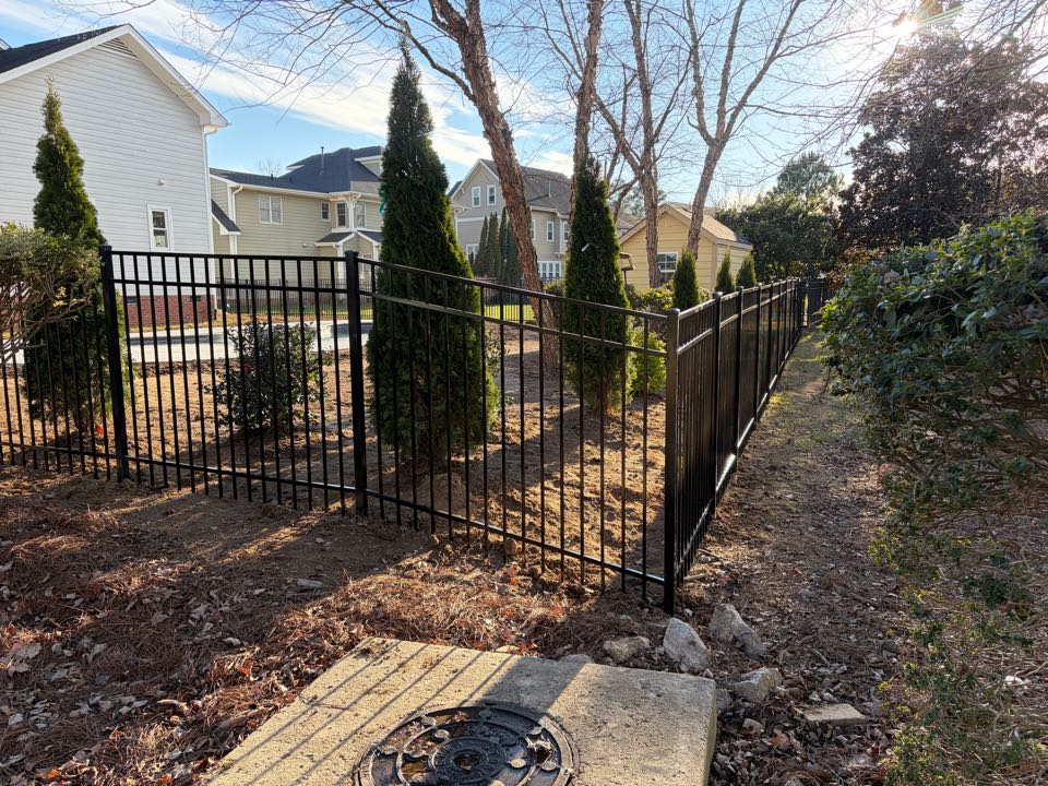 Raleigh, NC - Another beautiful pool fence. The client’s family is safe with this 5’ black aluminum fence. 